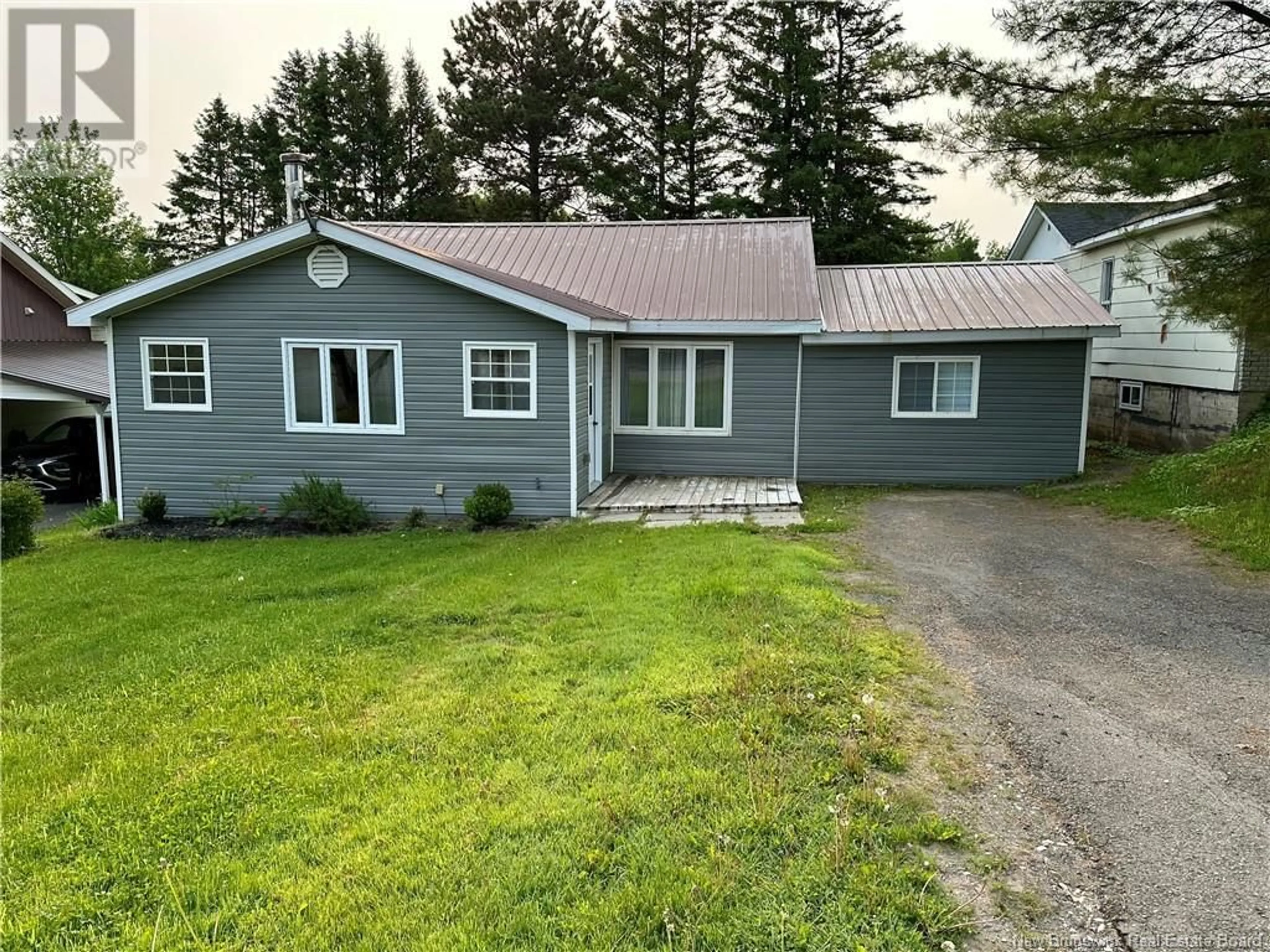 Home with vinyl exterior material, street for 142 MAIN STREET, Plaster Rock New Brunswick E7G2E4