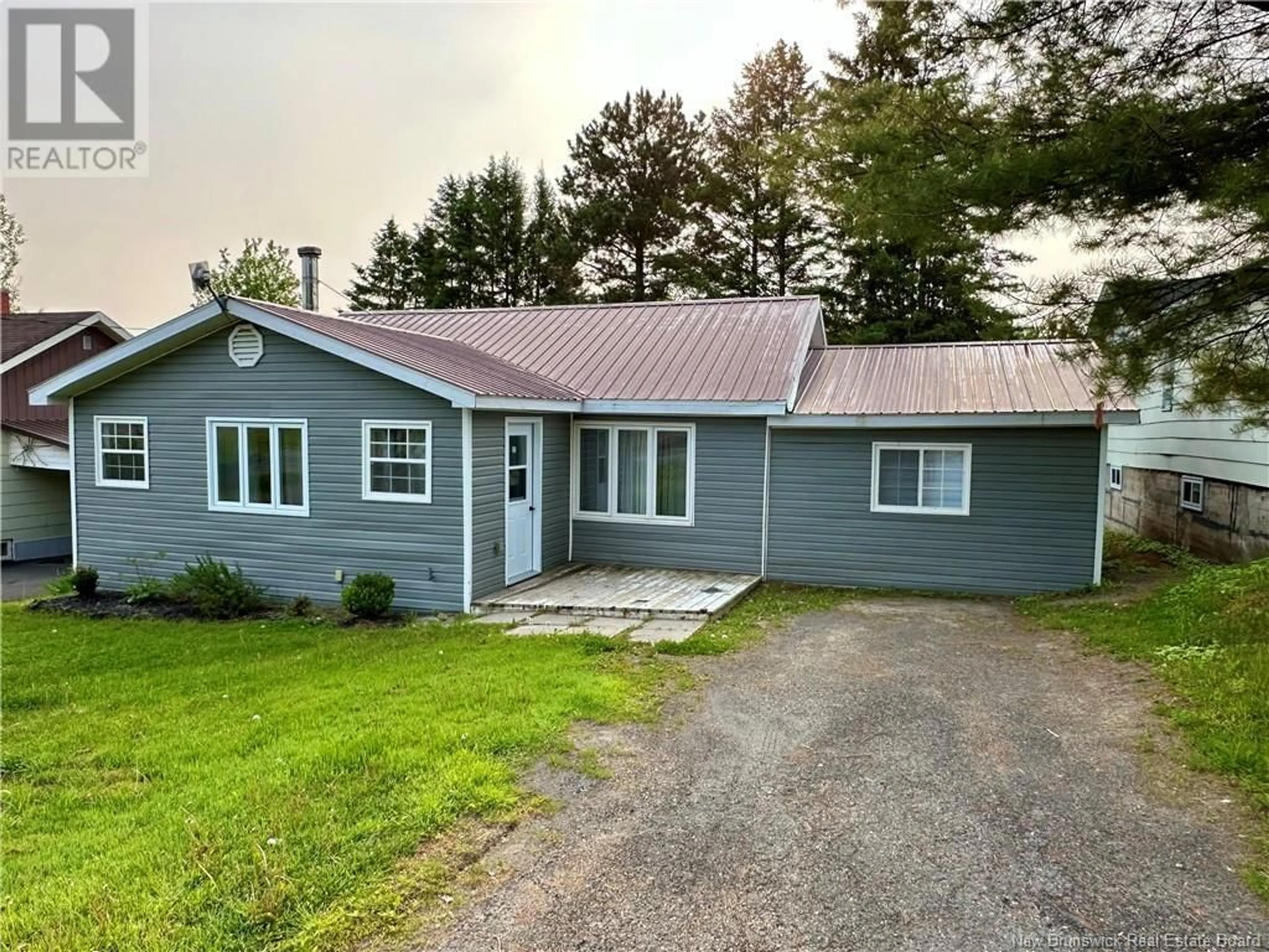 Home with vinyl exterior material, street for 142 MAIN STREET, Plaster Rock New Brunswick E7G2E4
