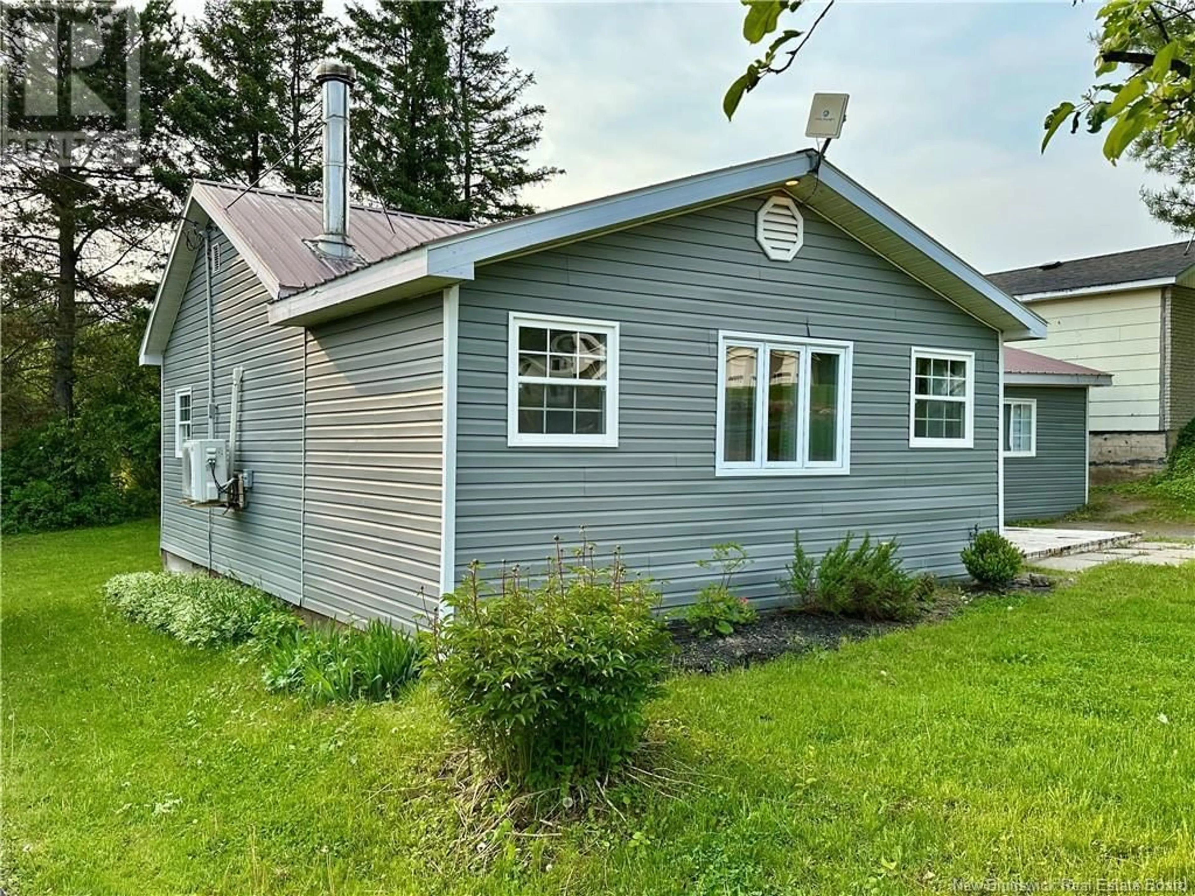 Home with vinyl exterior material, unknown for 142 MAIN STREET, Plaster Rock New Brunswick E7G2E4