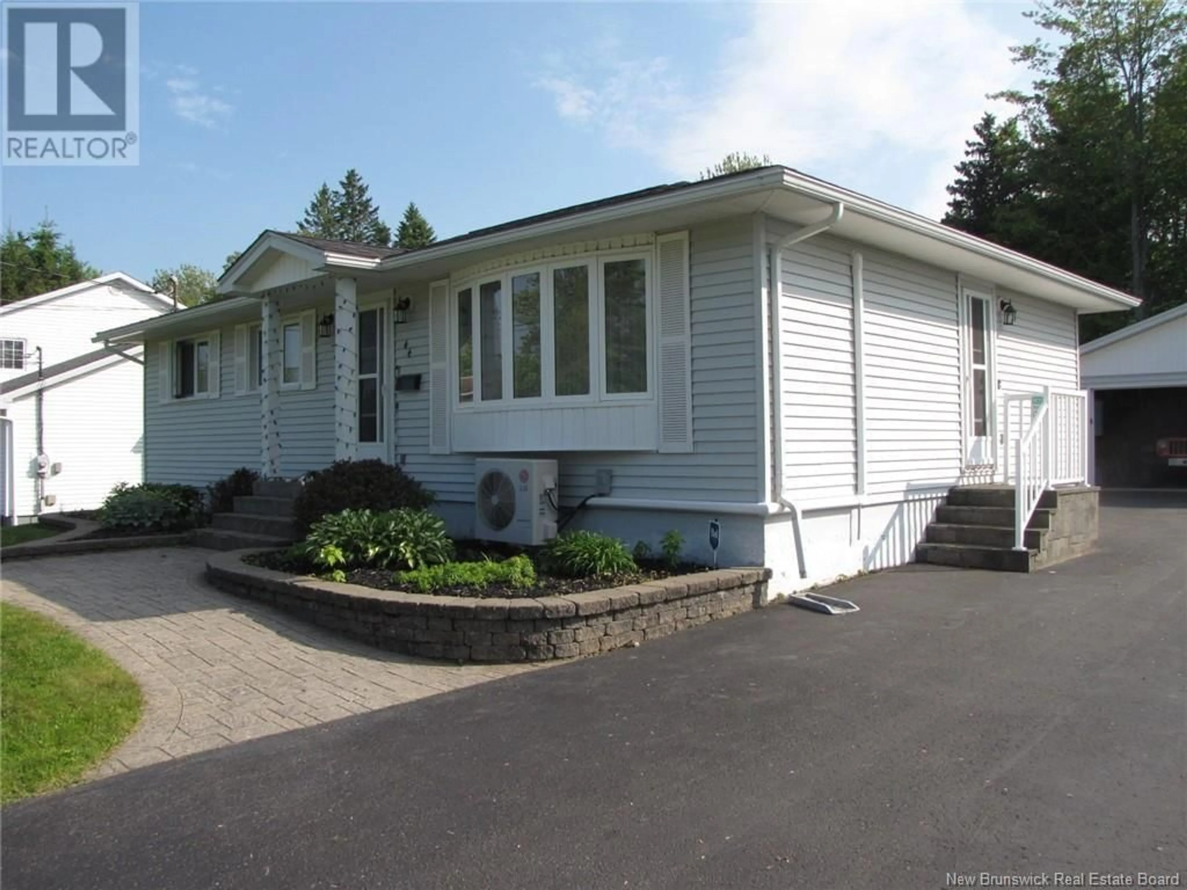 Home with vinyl exterior material, street for 44 WOODLAWN AVENUE, Moncton New Brunswick E1E2J9