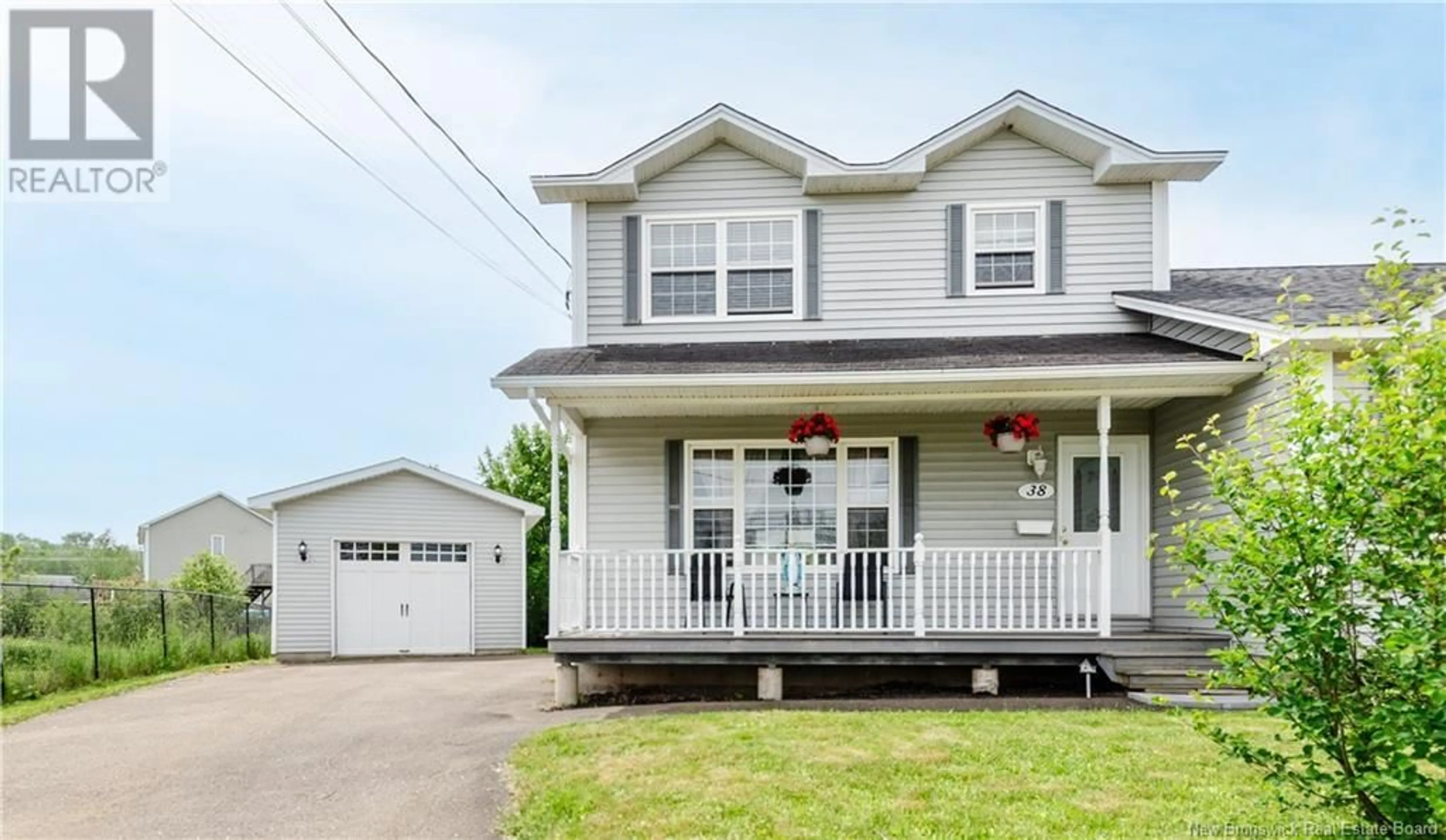Home with vinyl exterior material, street for 38 RENNICK ROAD, Moncton New Brunswick E1G4T9