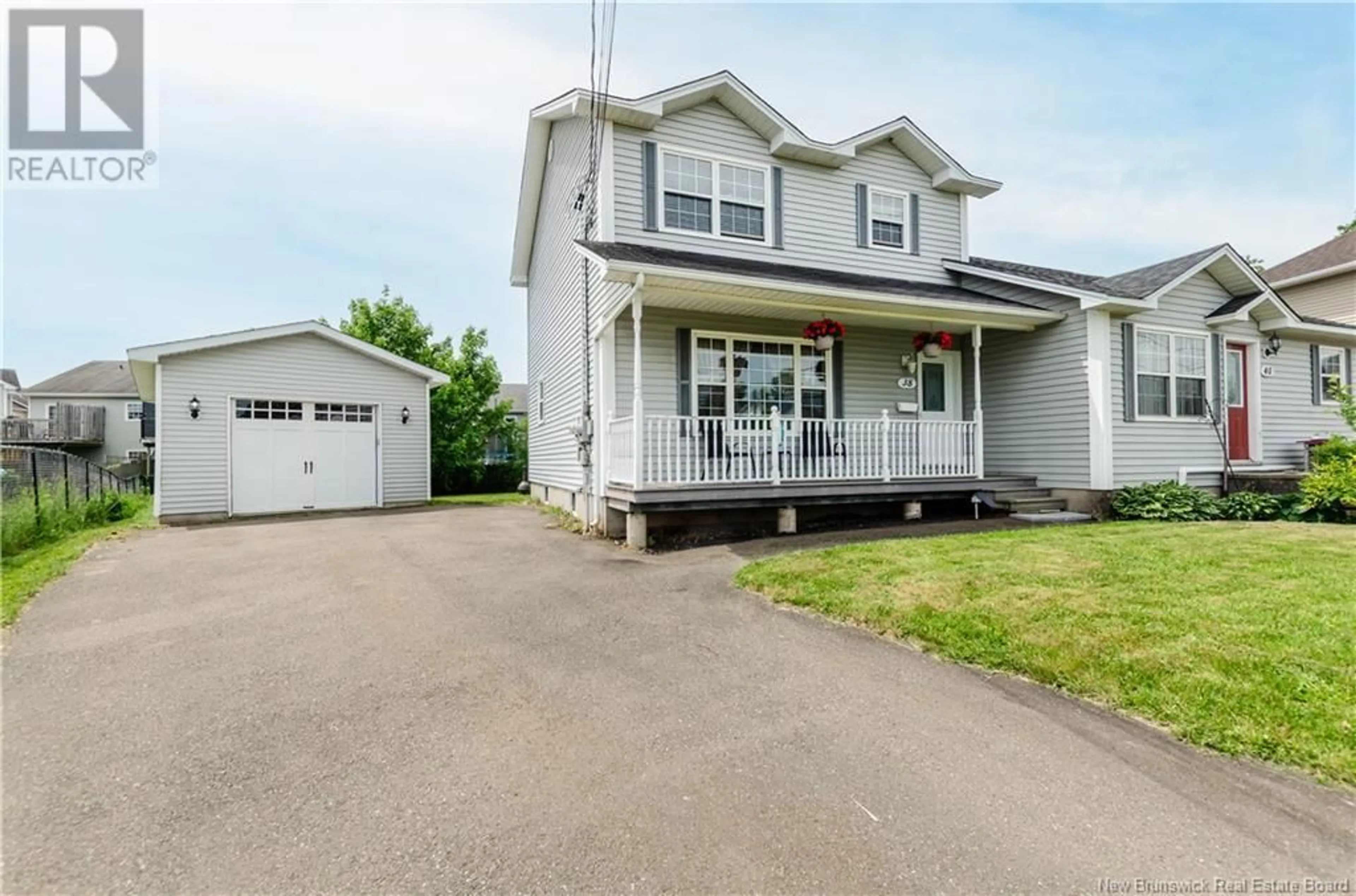 Home with vinyl exterior material, street for 38 RENNICK ROAD, Moncton New Brunswick E1G4T9