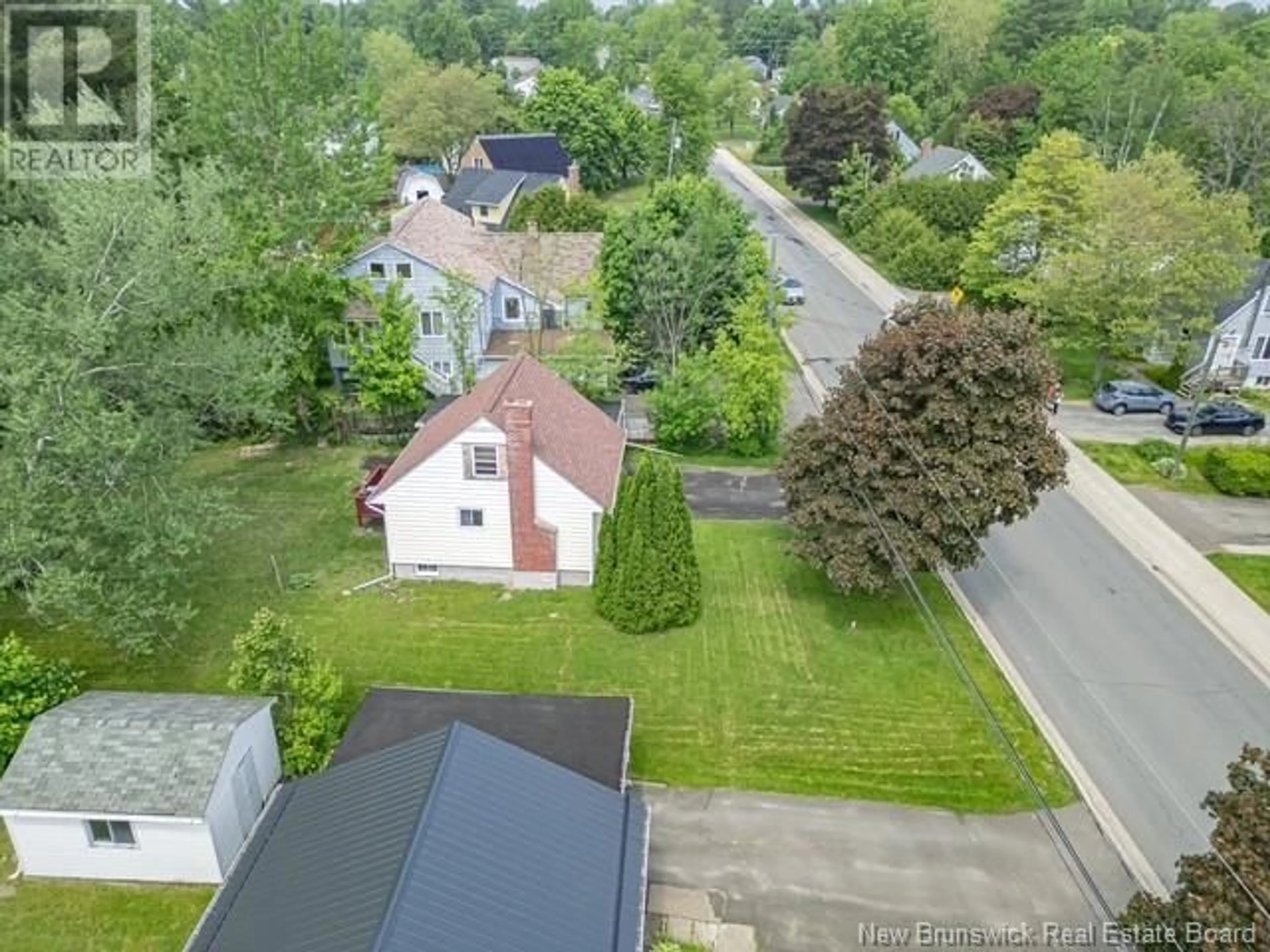 A pic from outside/outdoor area/front of a property/back of a property/a pic from drone, street for 105 FULTON AVENUE, Fredericton New Brunswick E3A2B5