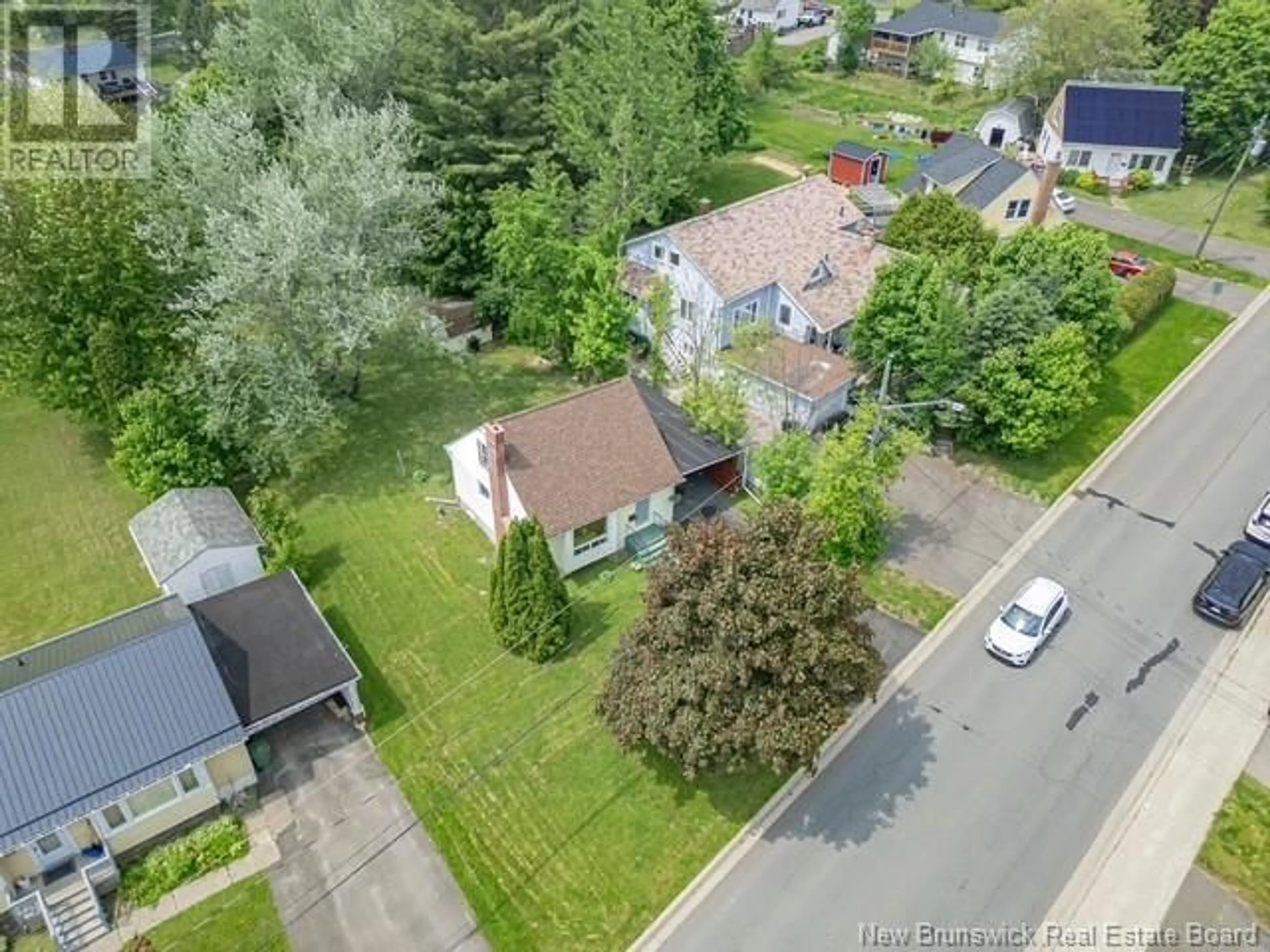 A pic from outside/outdoor area/front of a property/back of a property/a pic from drone, street for 105 FULTON AVENUE, Fredericton New Brunswick E3A2B5