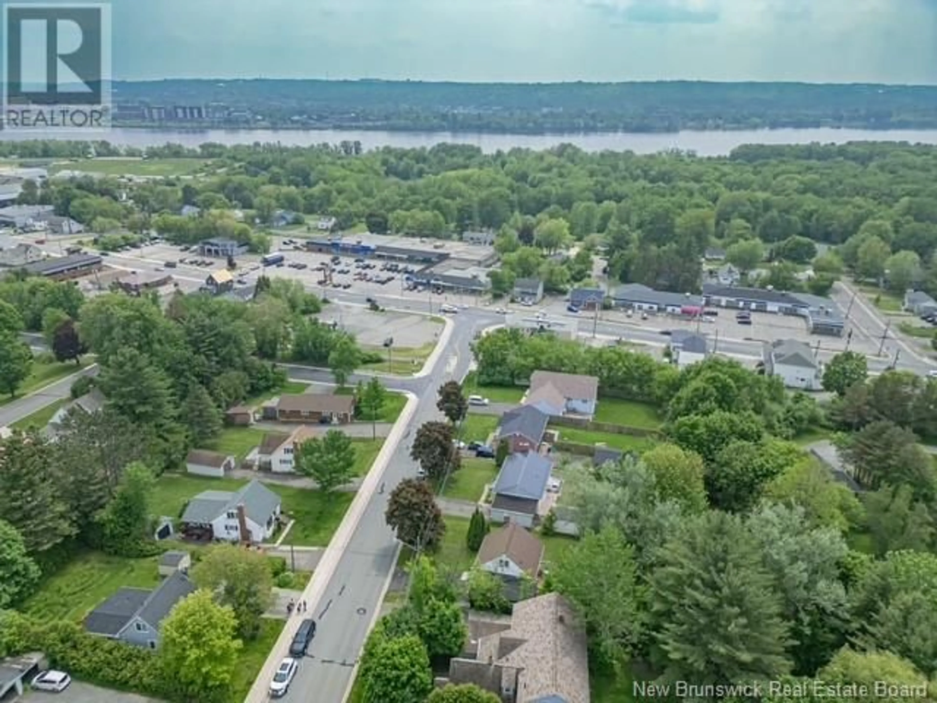 A pic from outside/outdoor area/front of a property/back of a property/a pic from drone, water/lake/river/ocean view for 105 FULTON AVENUE, Fredericton New Brunswick E3A2B5