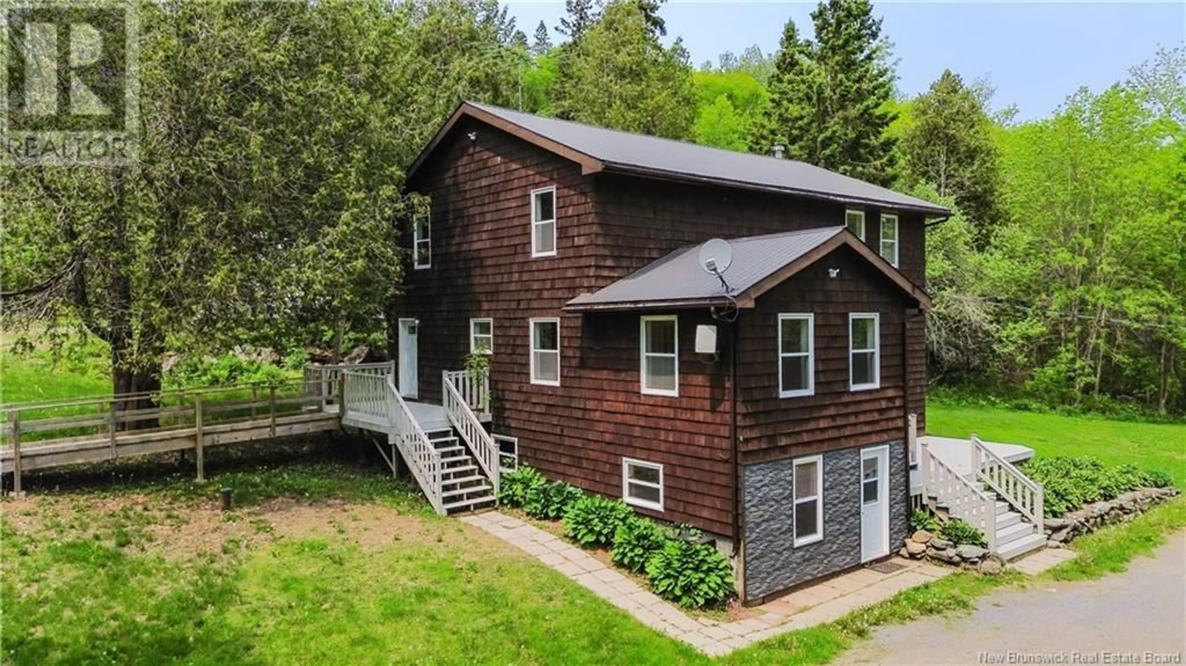 A pic from outside/outdoor area/front of a property/back of a property/a pic from drone, street for Route 102 - 6390 OAK POINT ROAD, Oak Point New Brunswick E5M2G8