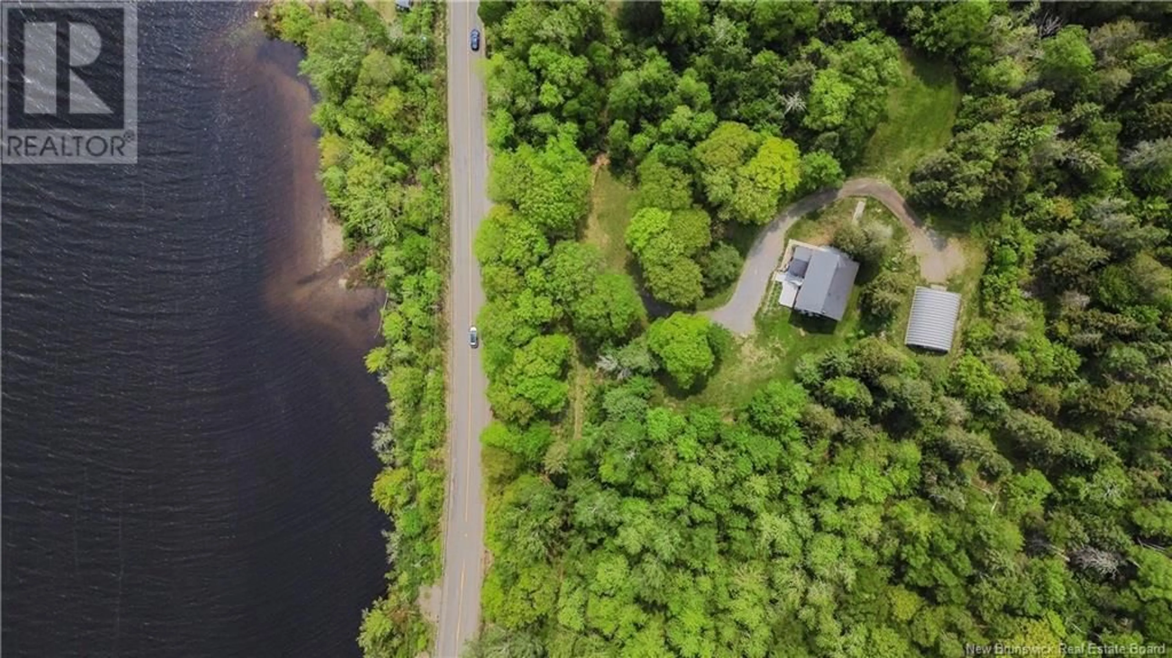 A pic from outside/outdoor area/front of a property/back of a property/a pic from drone, forest/trees view for Route 102 - 6390 OAK POINT ROAD, Oak Point New Brunswick E5M2G8