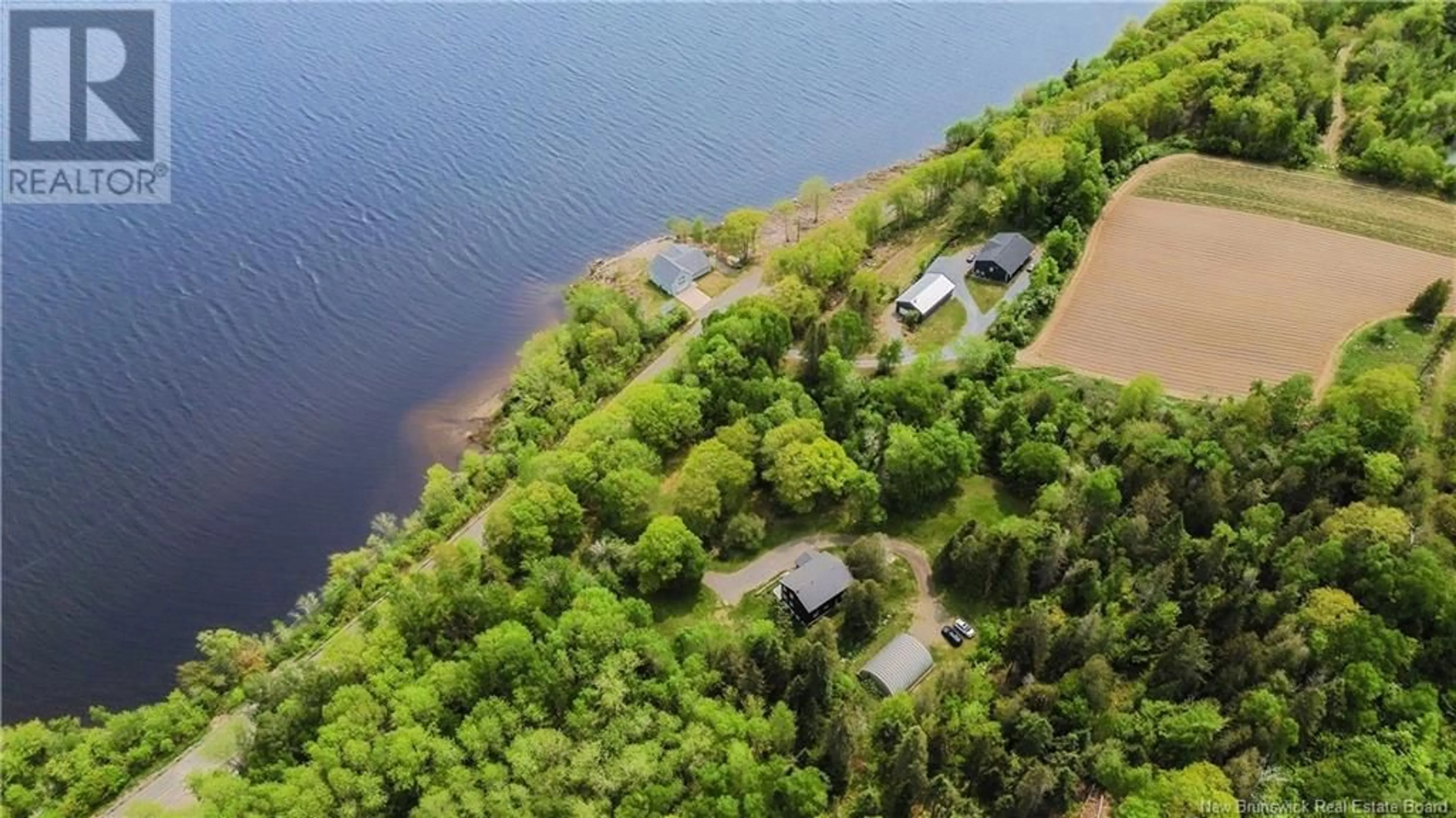 A pic from outside/outdoor area/front of a property/back of a property/a pic from drone, water/lake/river/ocean view for Route 102 - 6390 OAK POINT ROAD, Oak Point New Brunswick E5M2G8