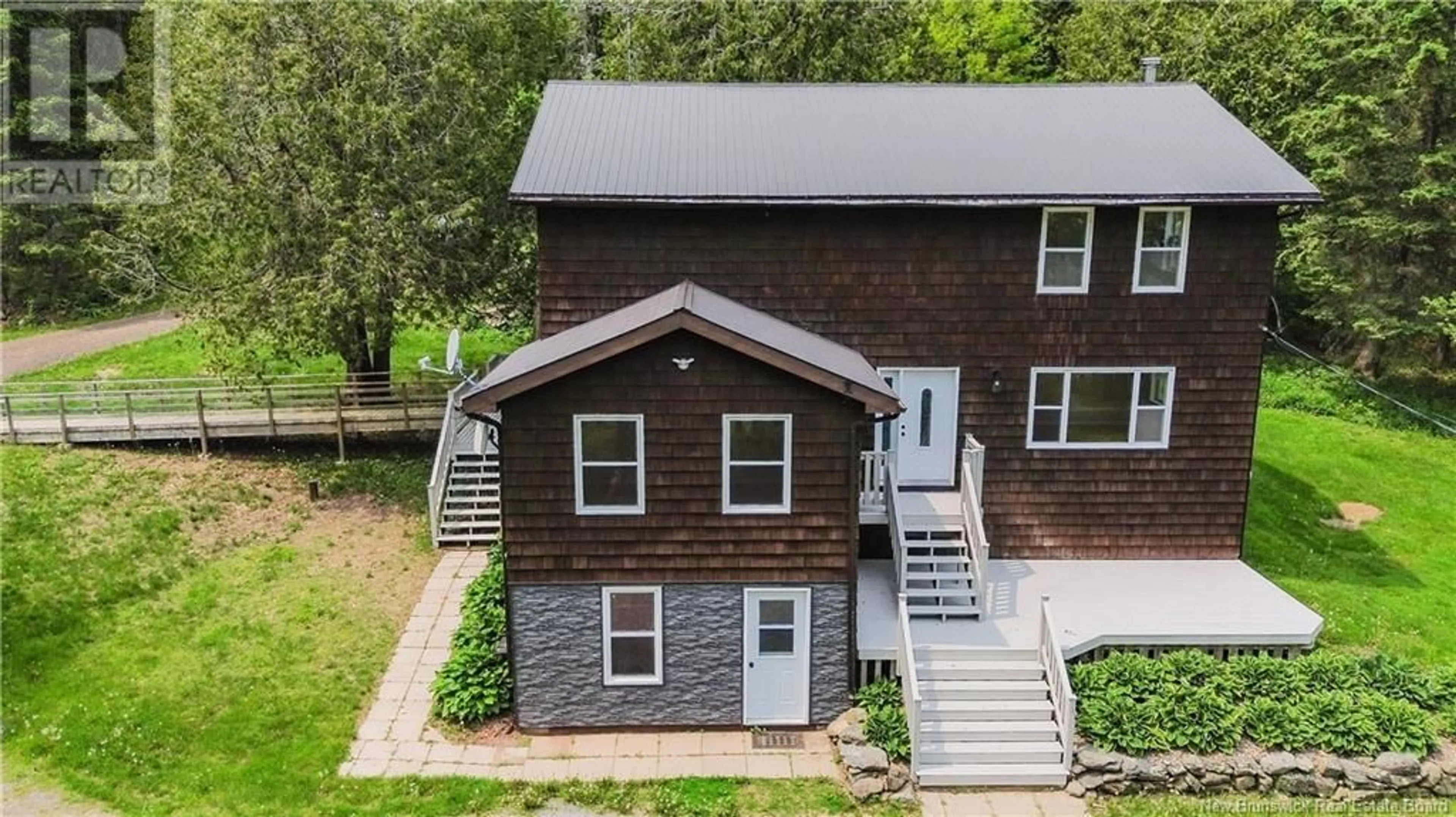 A pic from outside/outdoor area/front of a property/back of a property/a pic from drone, building for Route 102 - 6390 OAK POINT ROAD, Oak Point New Brunswick E5M2G8