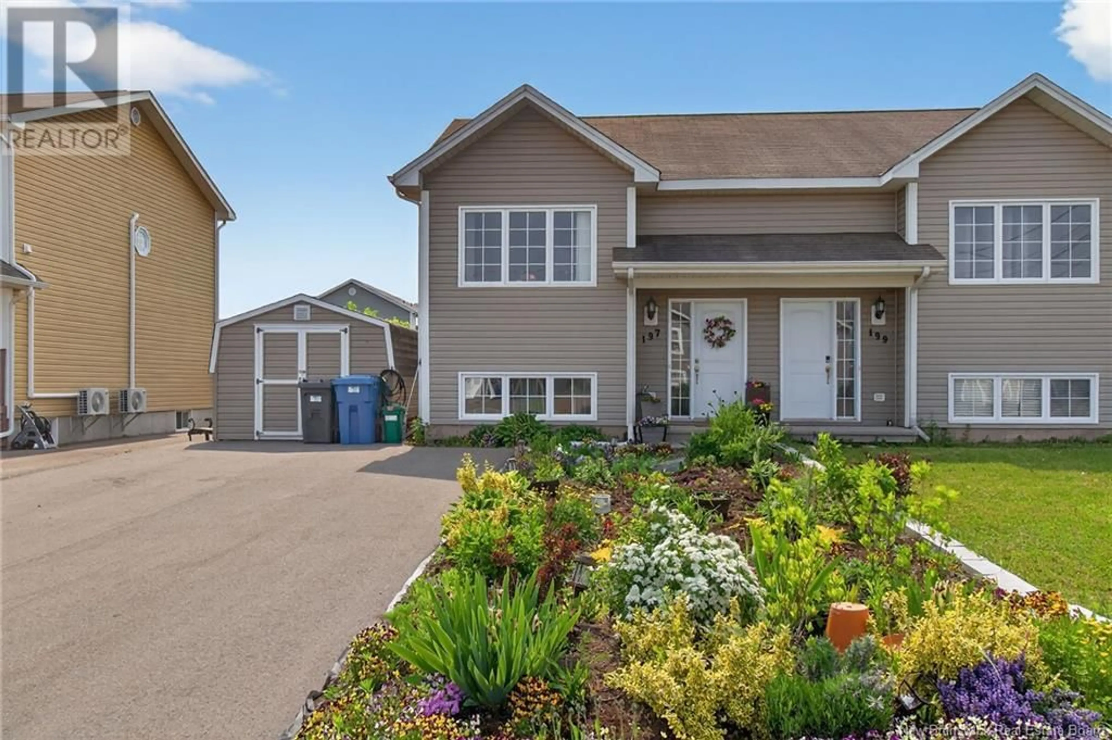 Home with vinyl exterior material, street for 197 BEDARD STREET, Dieppe New Brunswick E1A0H1