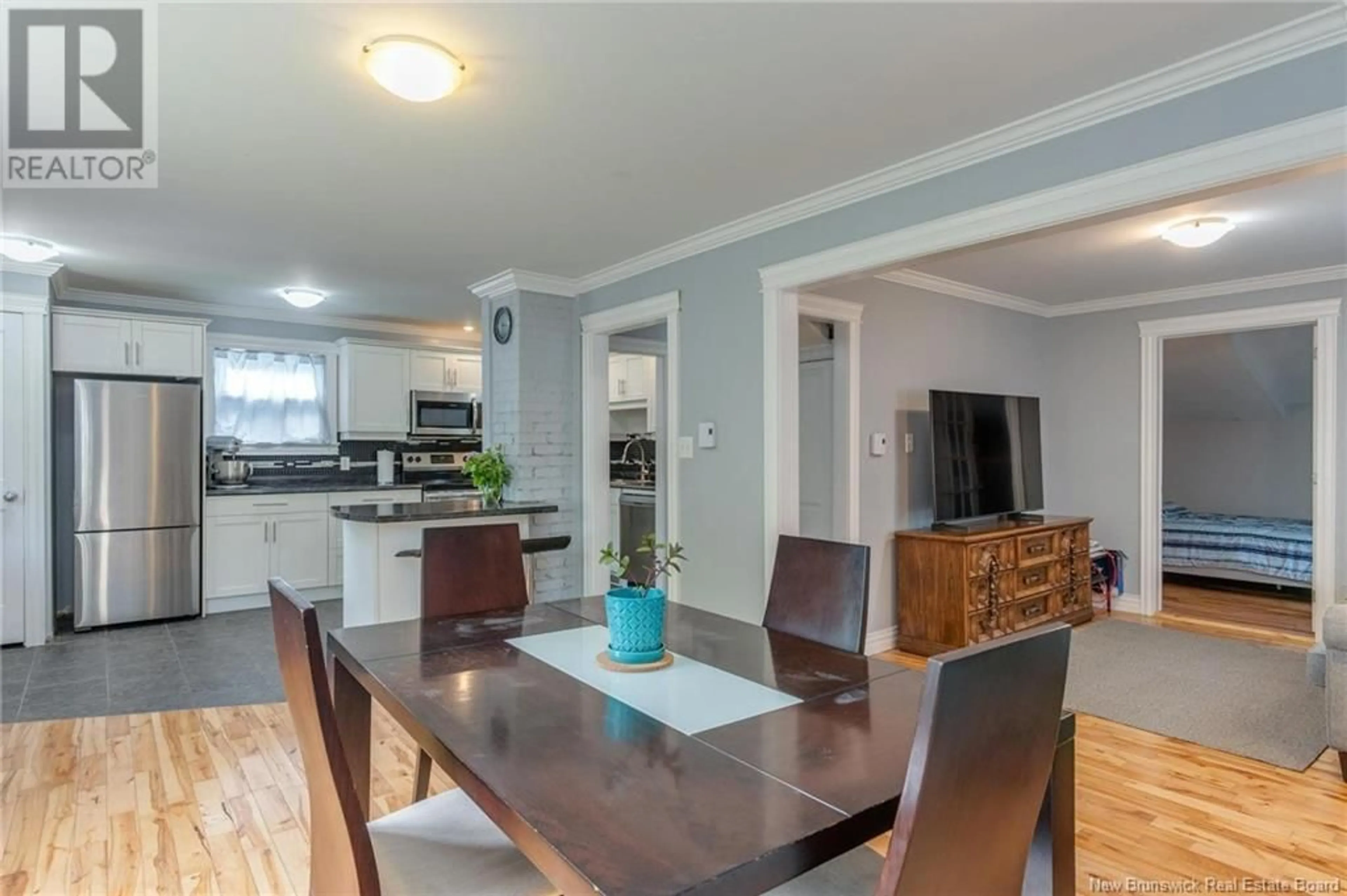 Open concept kitchen, wood/laminate floor for 9 FEGAN COURT, Saint John New Brunswick E2K2T5