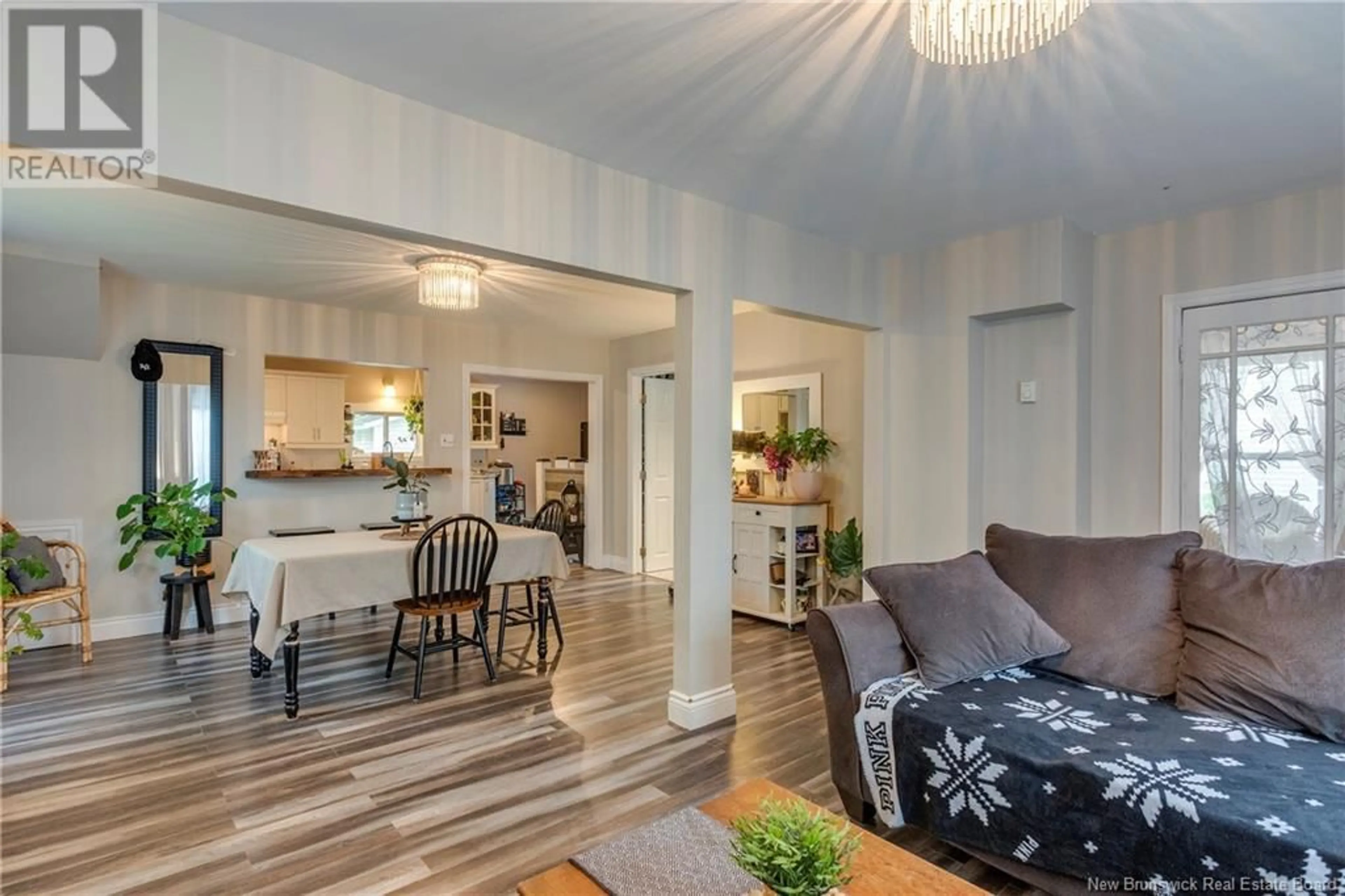Open concept kitchen, wood/laminate floor for 14 CURRIE AVENUE, Saint John New Brunswick E2K3A6