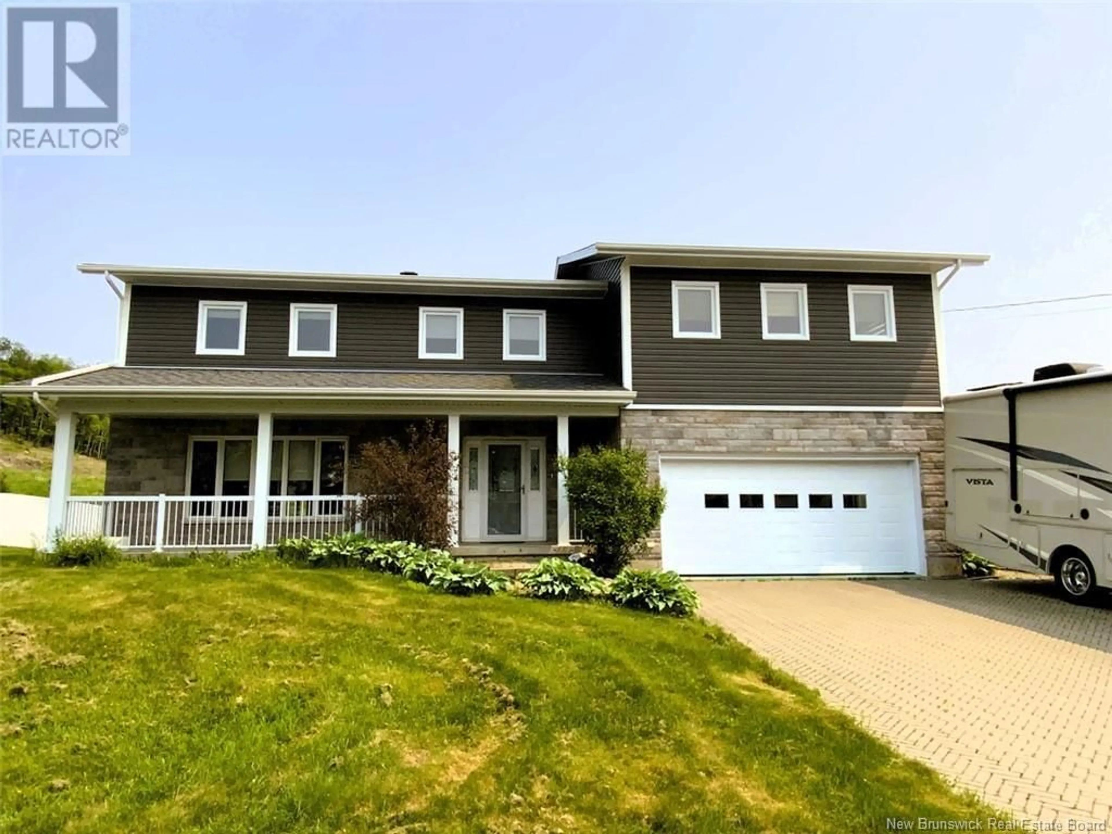 Home with vinyl exterior material, street for 33 THIBAUDEAU AVENUE, Edmundston New Brunswick E3V4Z1
