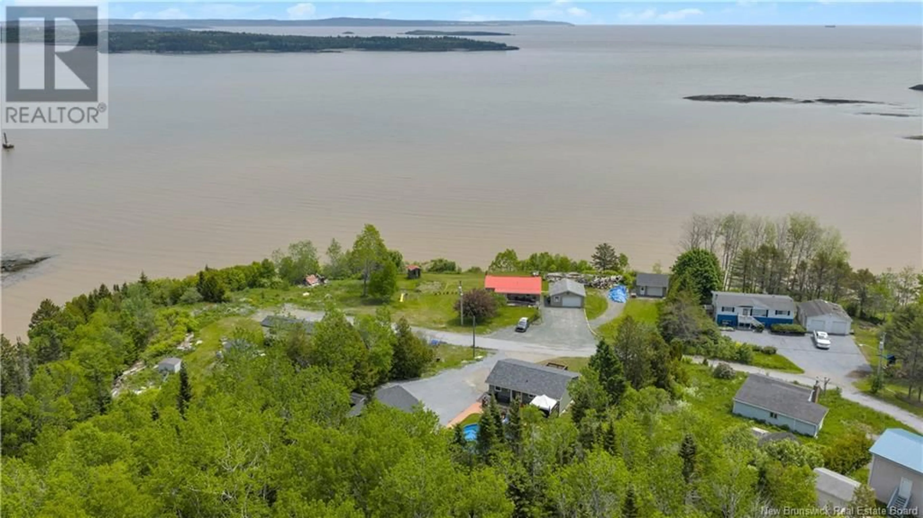 A pic from outside/outdoor area/front of a property/back of a property/a pic from drone, water/lake/river/ocean view for 81 SCHOOL BUS ROAD, Saint John New Brunswick E2M7E8