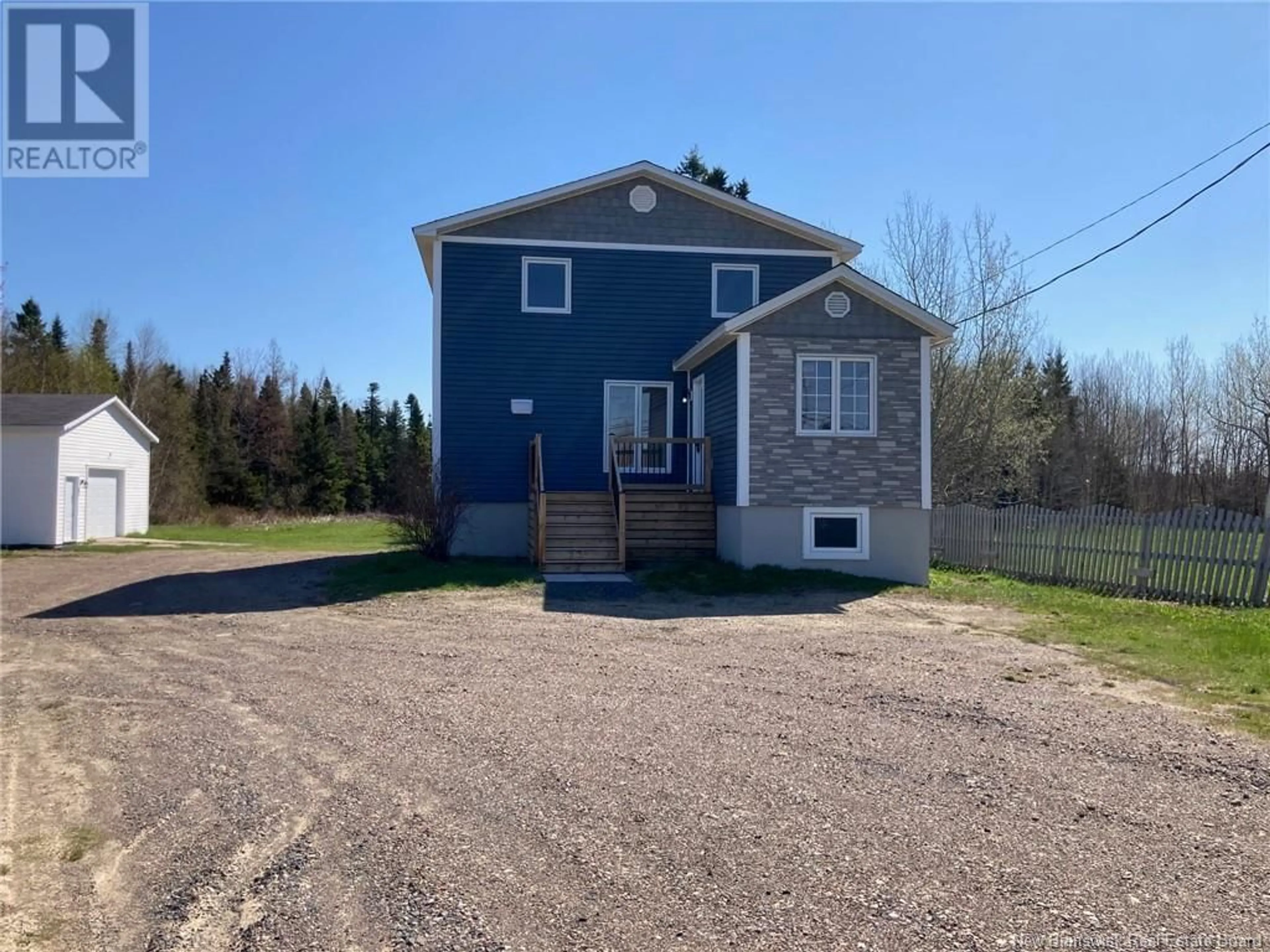 A pic from outside/outdoor area/front of a property/back of a property/a pic from drone, building for 3148 RUE PRINCIPALE, Tracadie New Brunswick E1X1A3
