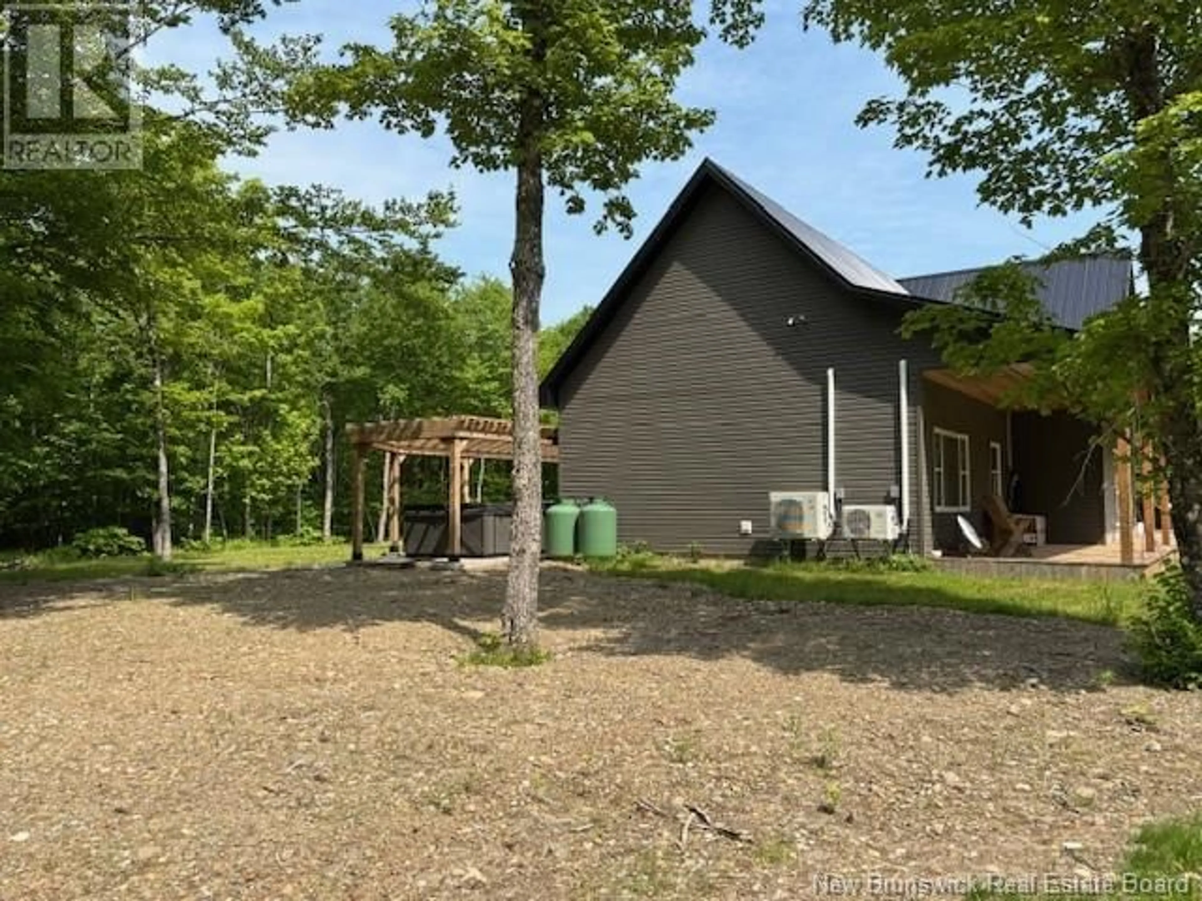 A pic from outside/outdoor area/front of a property/back of a property/a pic from drone, forest/trees view for 165 MCDOO ROAD, Springfield New Brunswick E5T2K4