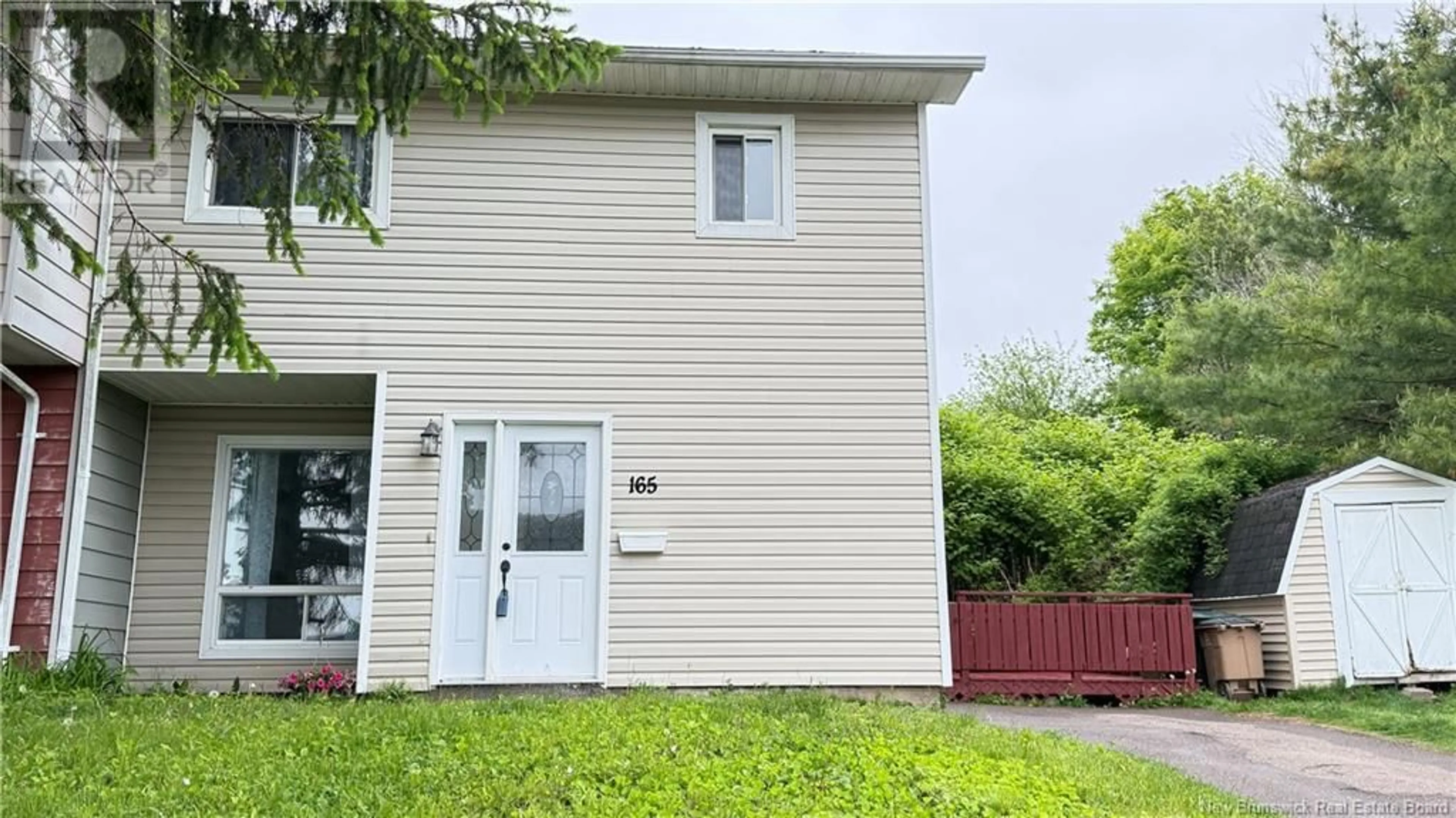 Home with vinyl exterior material, street for 165 WOODHAVEN DRIVE, Saint John New Brunswick E2K4M4