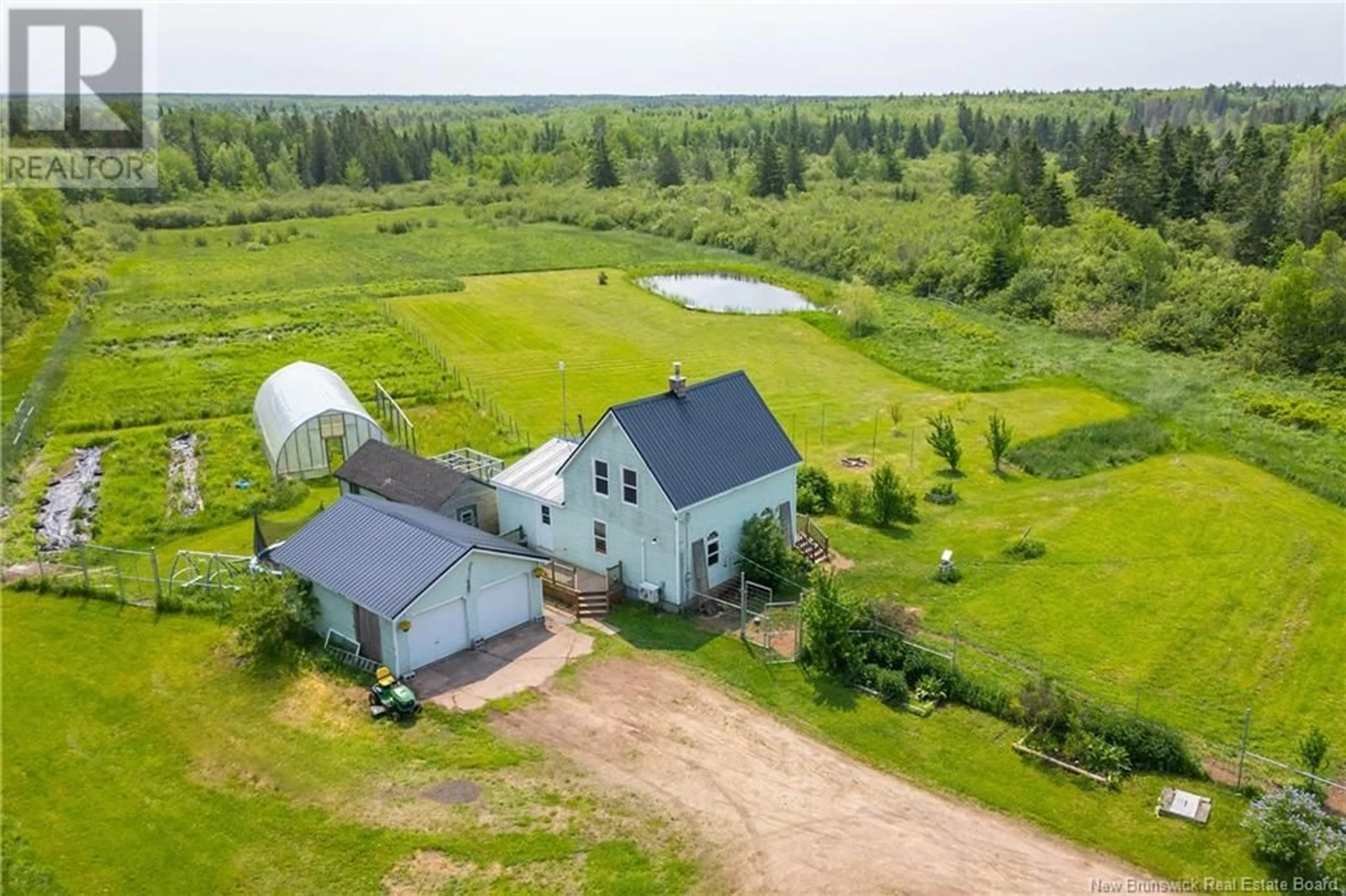A pic from outside/outdoor area/front of a property/back of a property/a pic from drone, water/lake/river/ocean view for 1783 ROUTE 940, Centre Village New Brunswick E4L1Y7