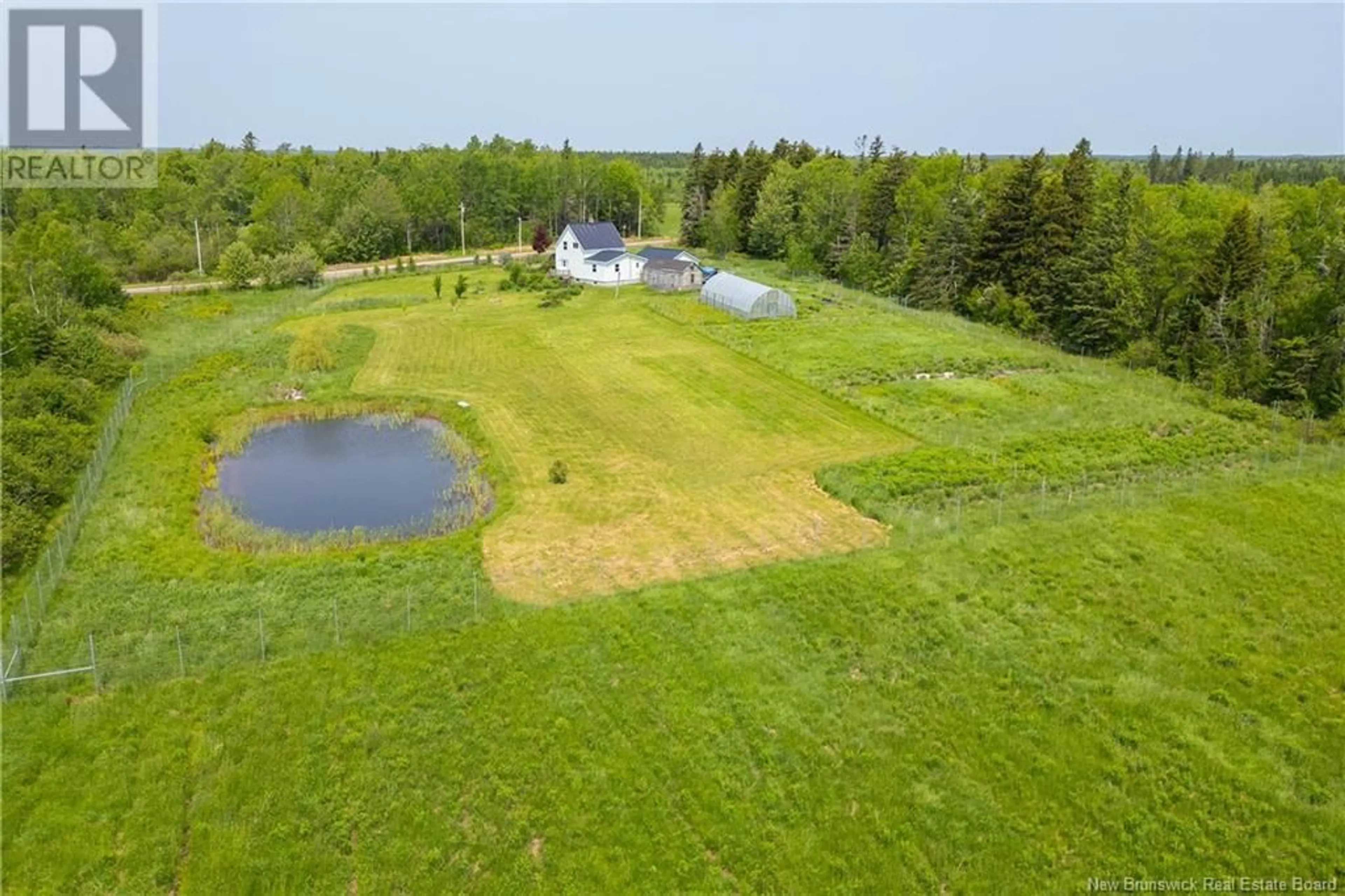A pic from outside/outdoor area/front of a property/back of a property/a pic from drone, water/lake/river/ocean view for 1783 ROUTE 940, Centre Village New Brunswick E4L1Y7