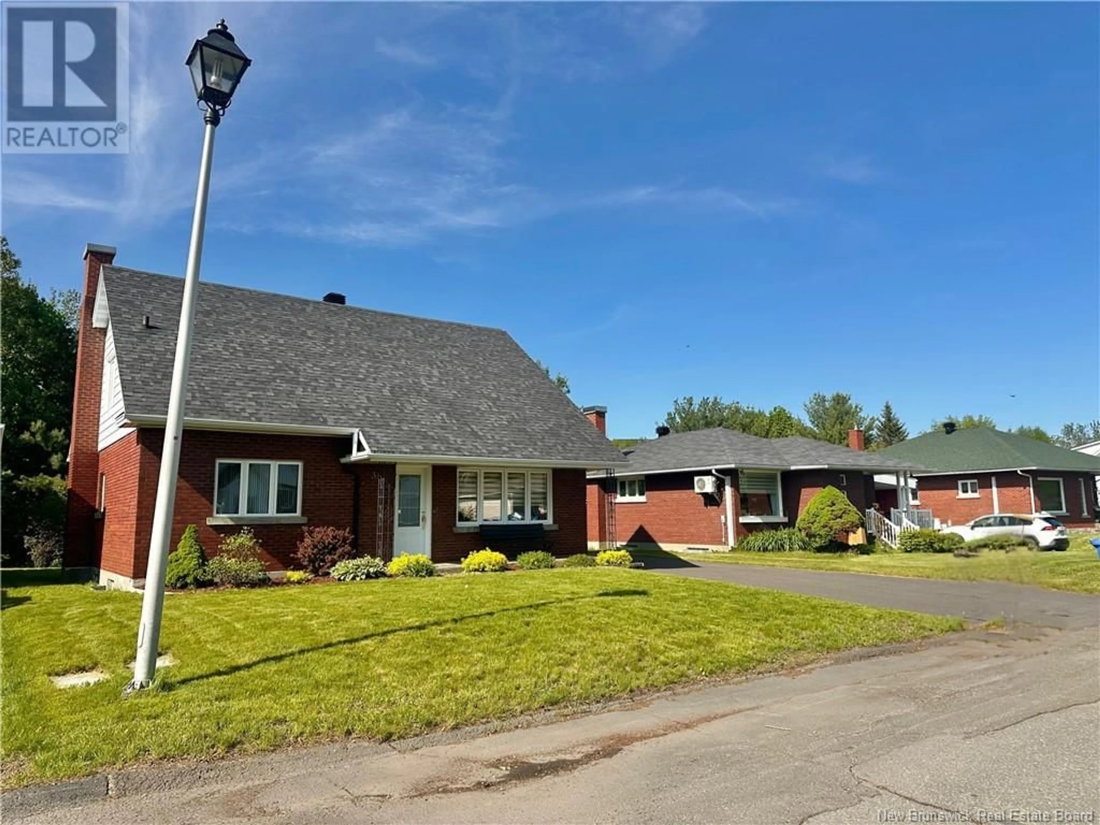 A pic from outside/outdoor area/front of a property/back of a property/a pic from drone, street for 38 VIMY, Edmundston New Brunswick E3V1B3
