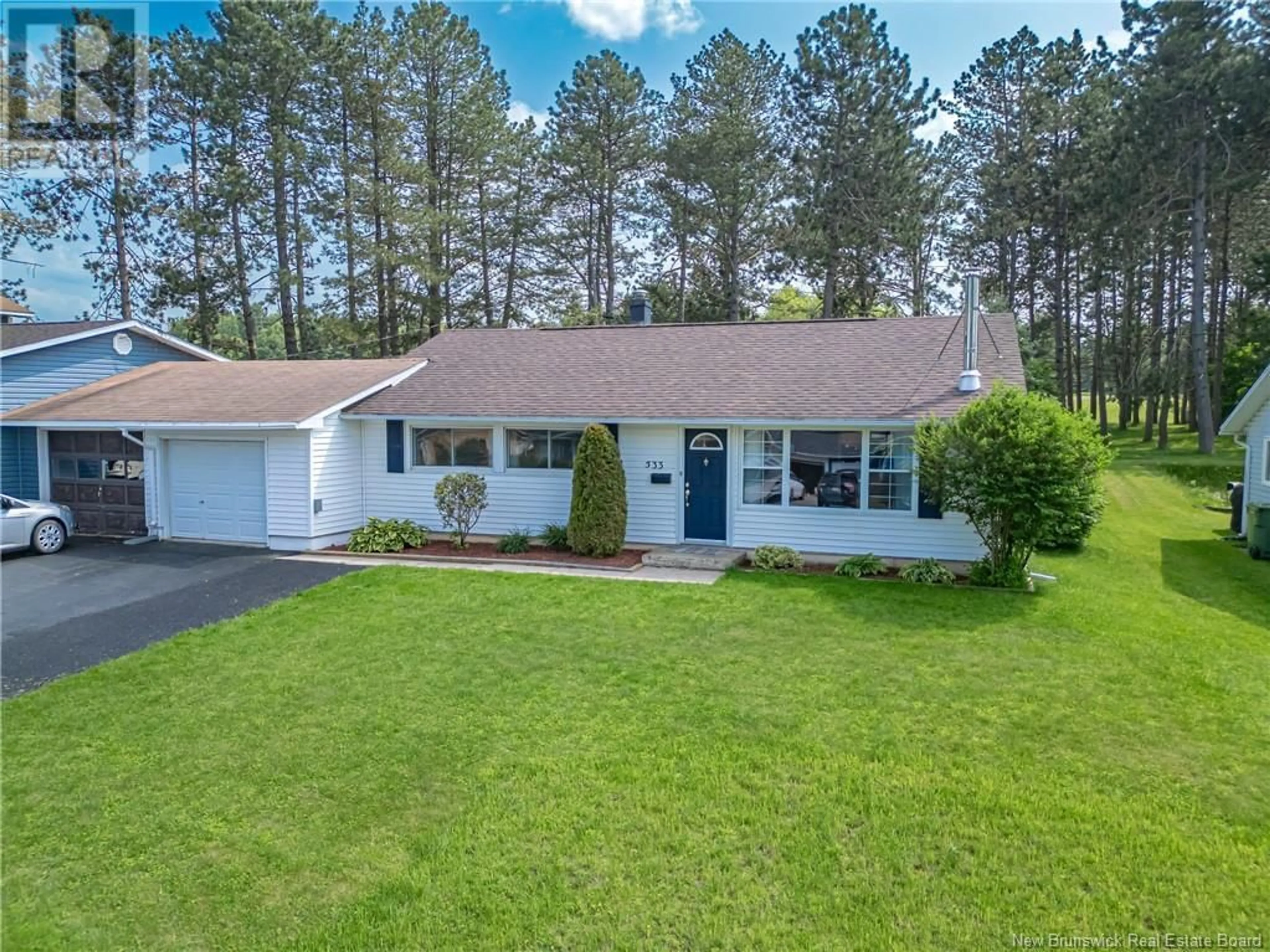 A pic from outside/outdoor area/front of a property/back of a property/a pic from drone, unknown for 533 SCOULLAR STREET, Oromocto New Brunswick E2V1H2