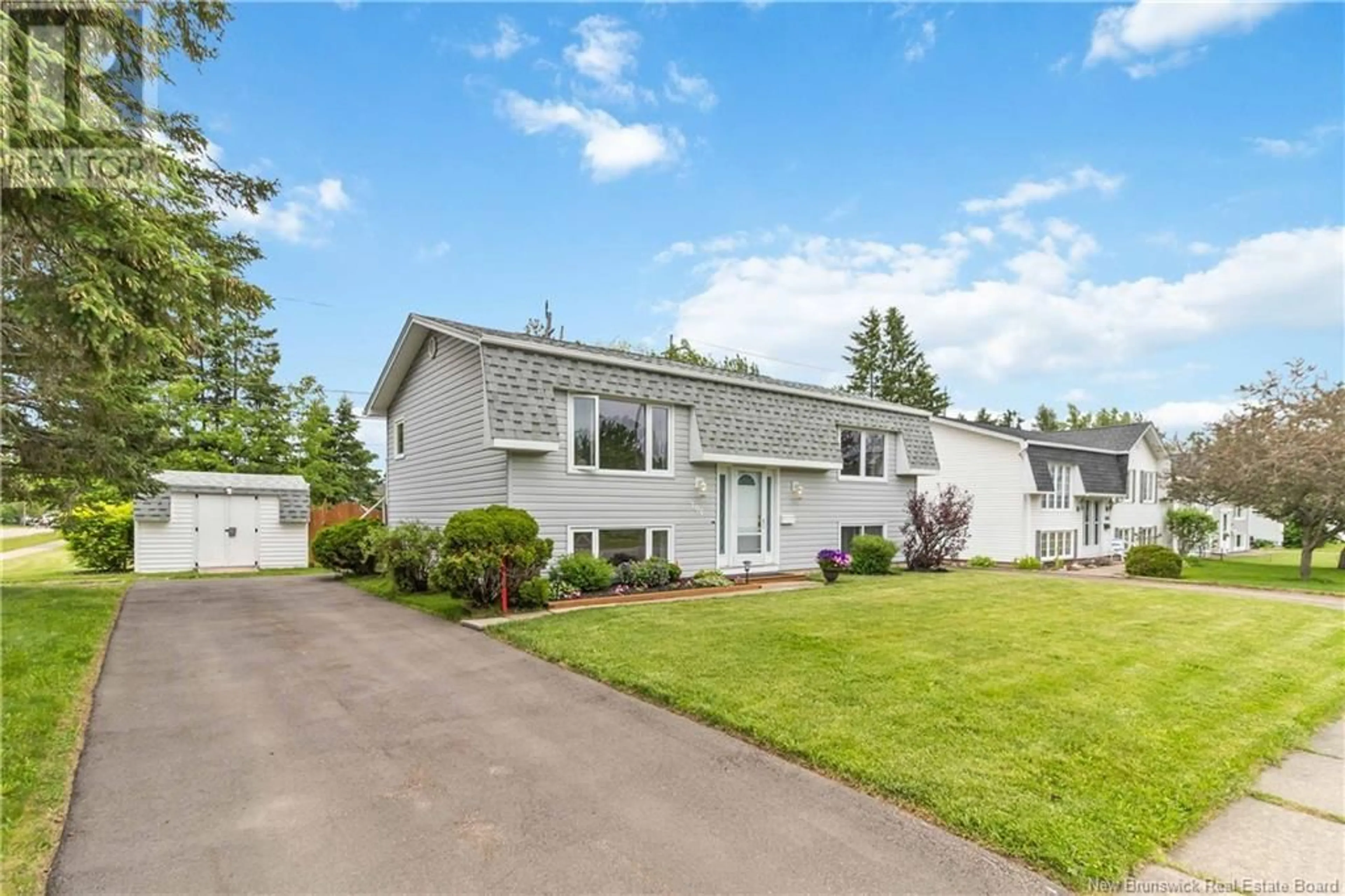 Home with vinyl exterior material, street for 106 KNOX DRIVE, Moncton New Brunswick E1G1L8