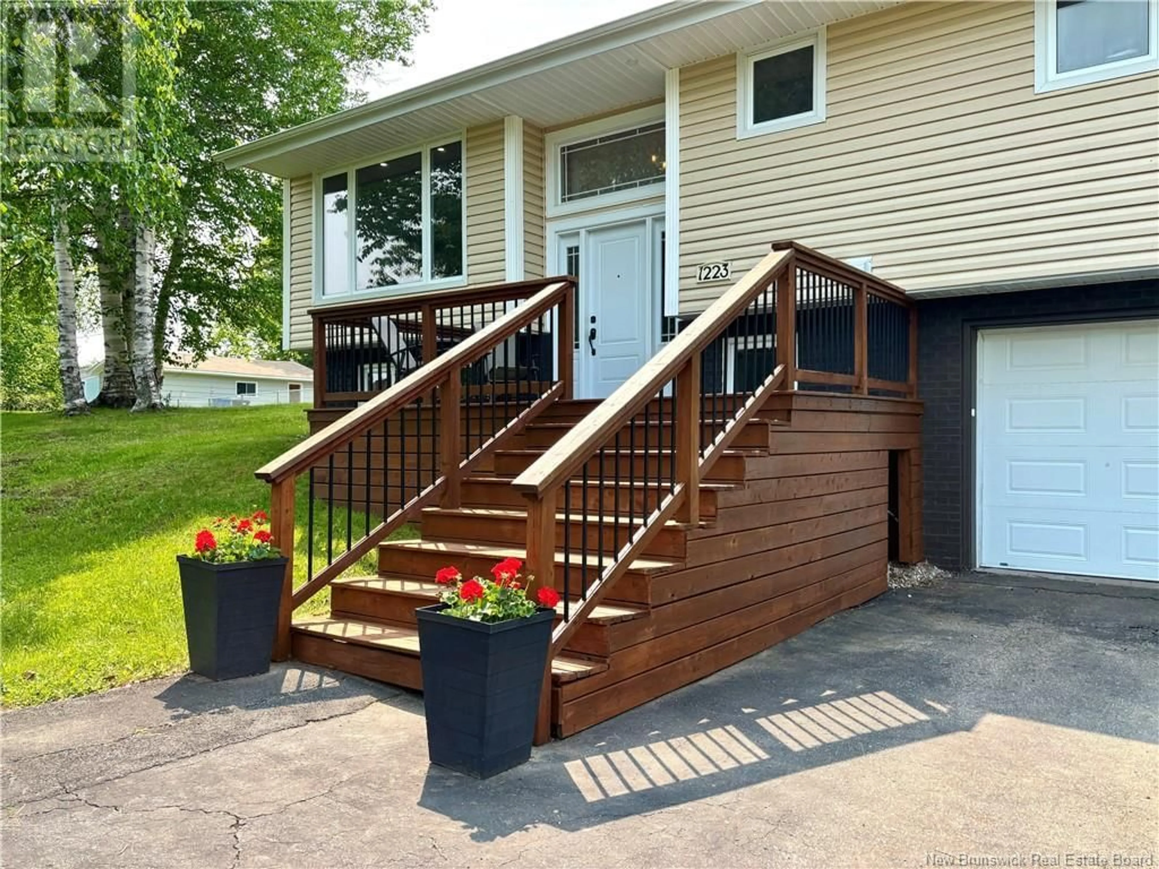 Home with vinyl exterior material, street for 1223 ULRIC, Bathurst New Brunswick E2A3X9