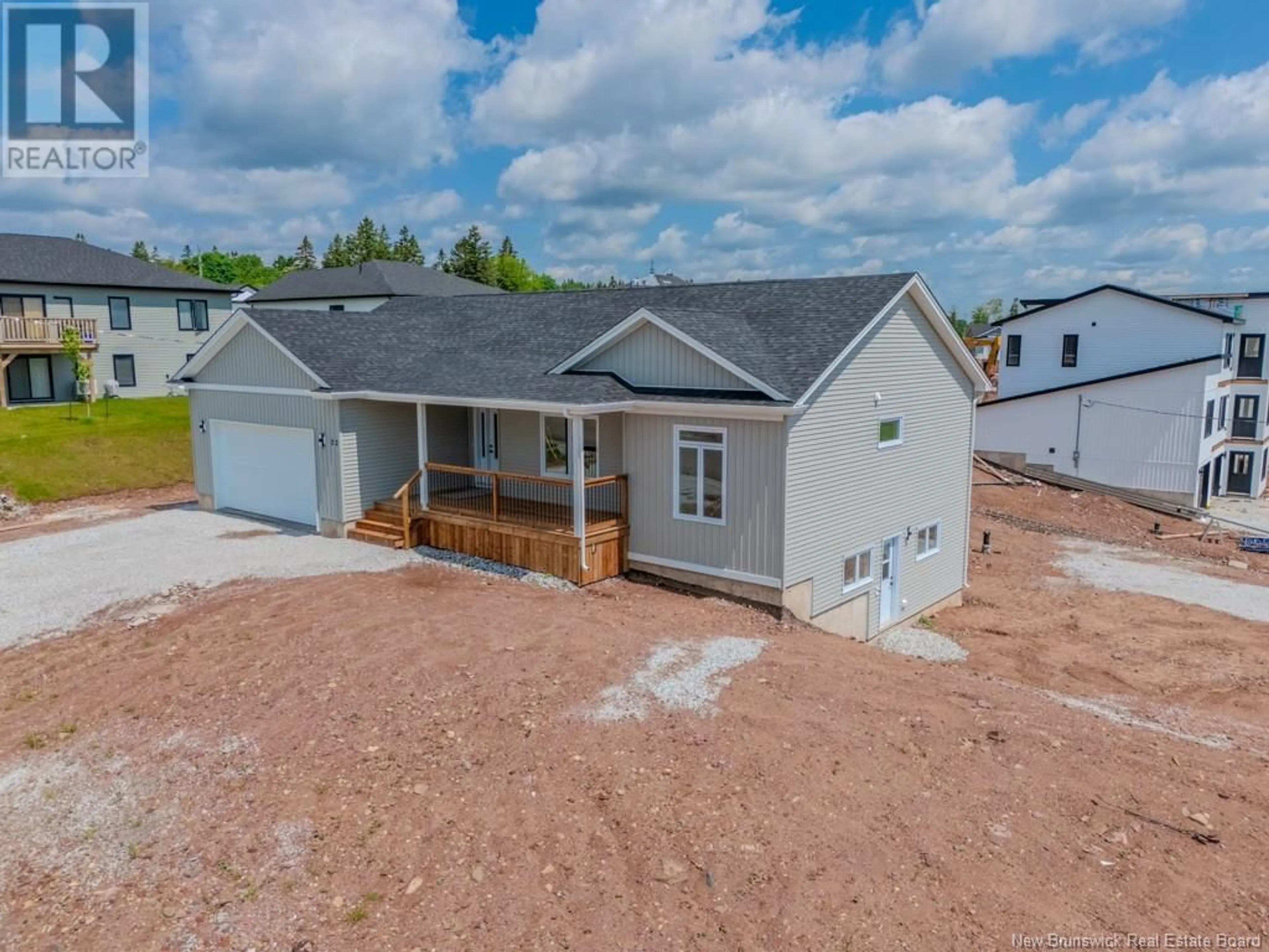 A pic from outside/outdoor area/front of a property/back of a property/a pic from drone, unknown for 22 GROSBEAK DRIVE, Quispamsis New Brunswick E2E0Y3