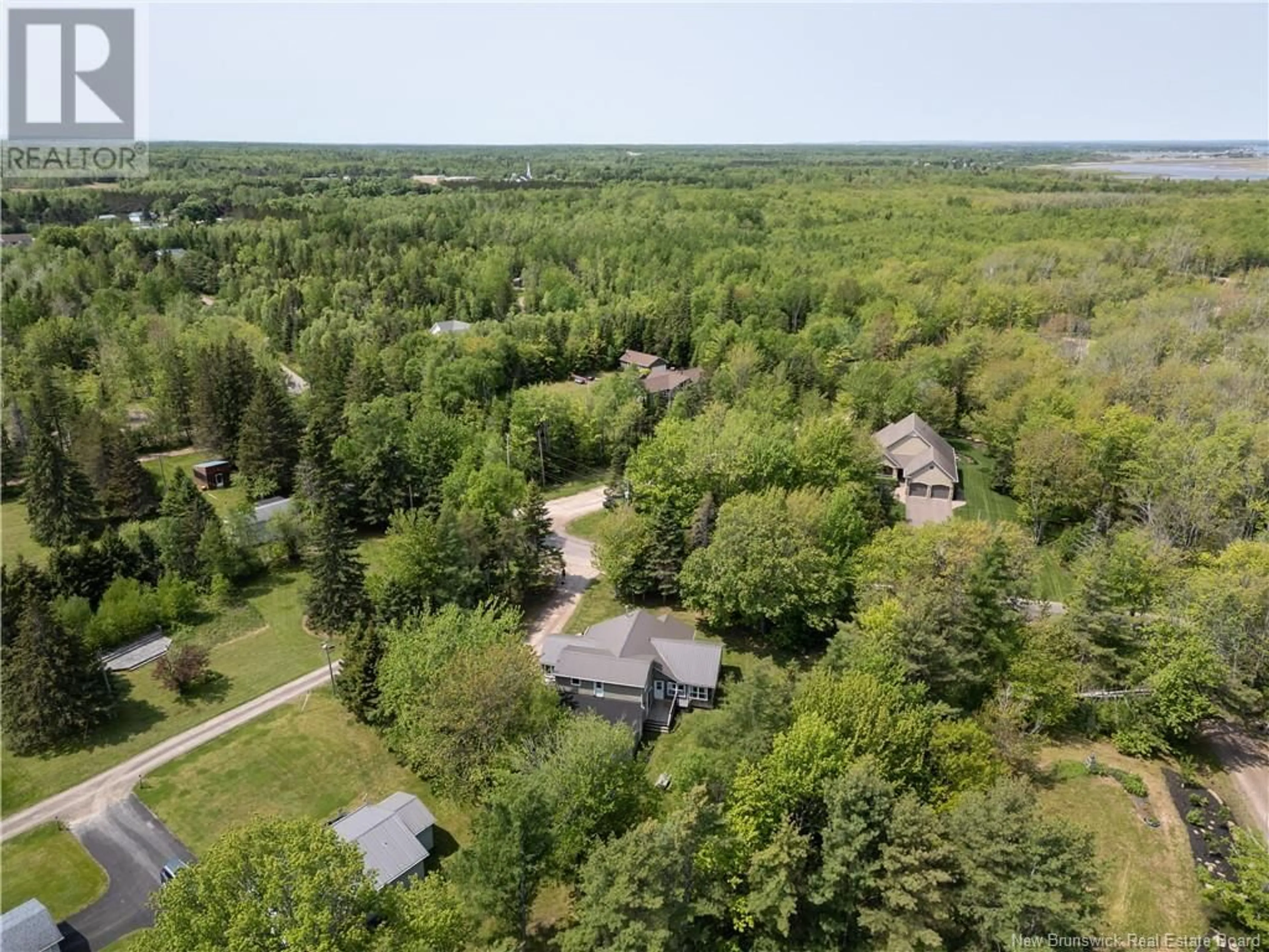 A pic from outside/outdoor area/front of a property/back of a property/a pic from drone, forest/trees view for 47 BARON, Grand-Barachois New Brunswick E4P6T4