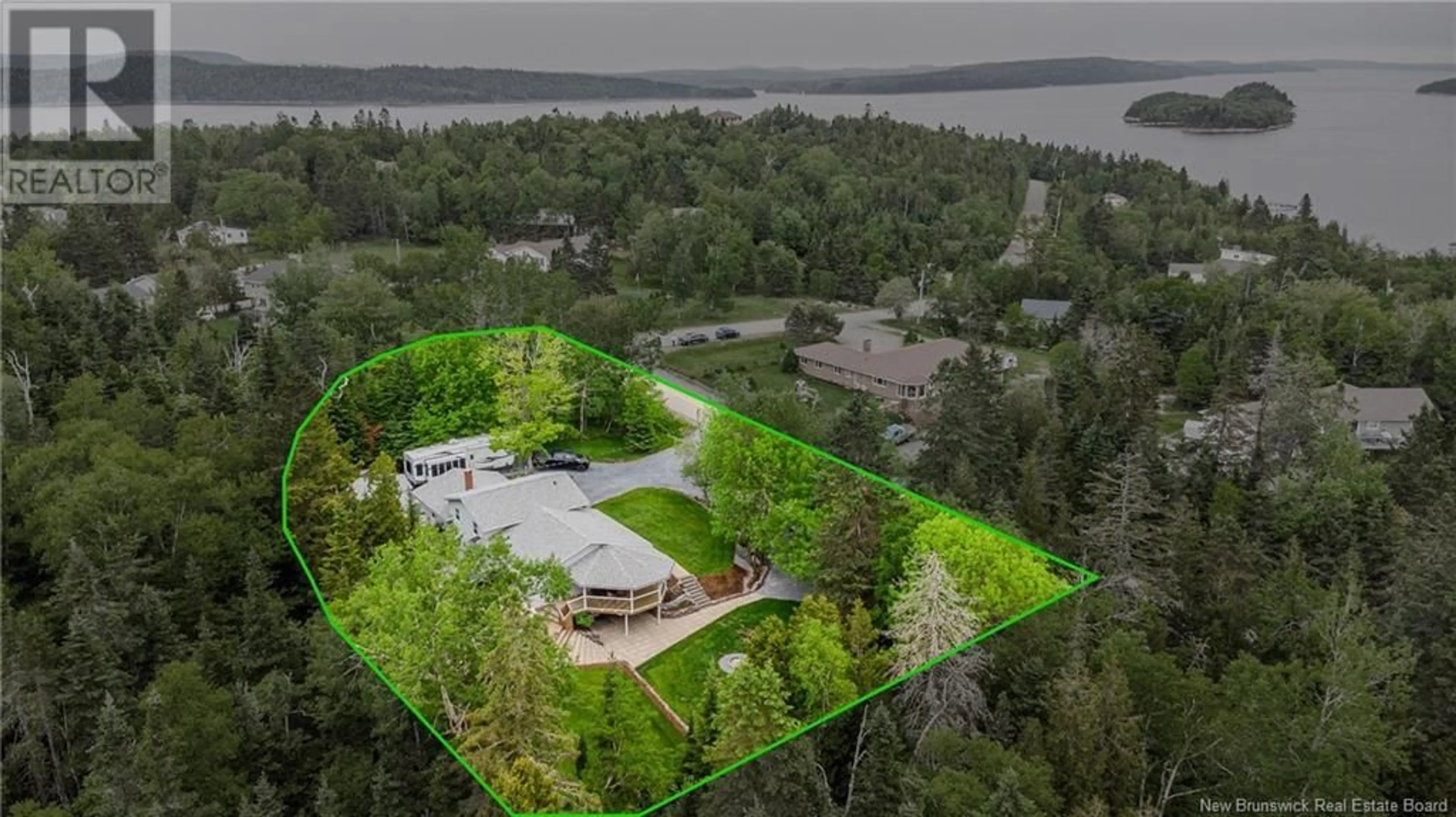 A pic from outside/outdoor area/front of a property/back of a property/a pic from drone, water/lake/river/ocean view for 249 RAGGED POINT ROAD, Saint John New Brunswick E2K5B5