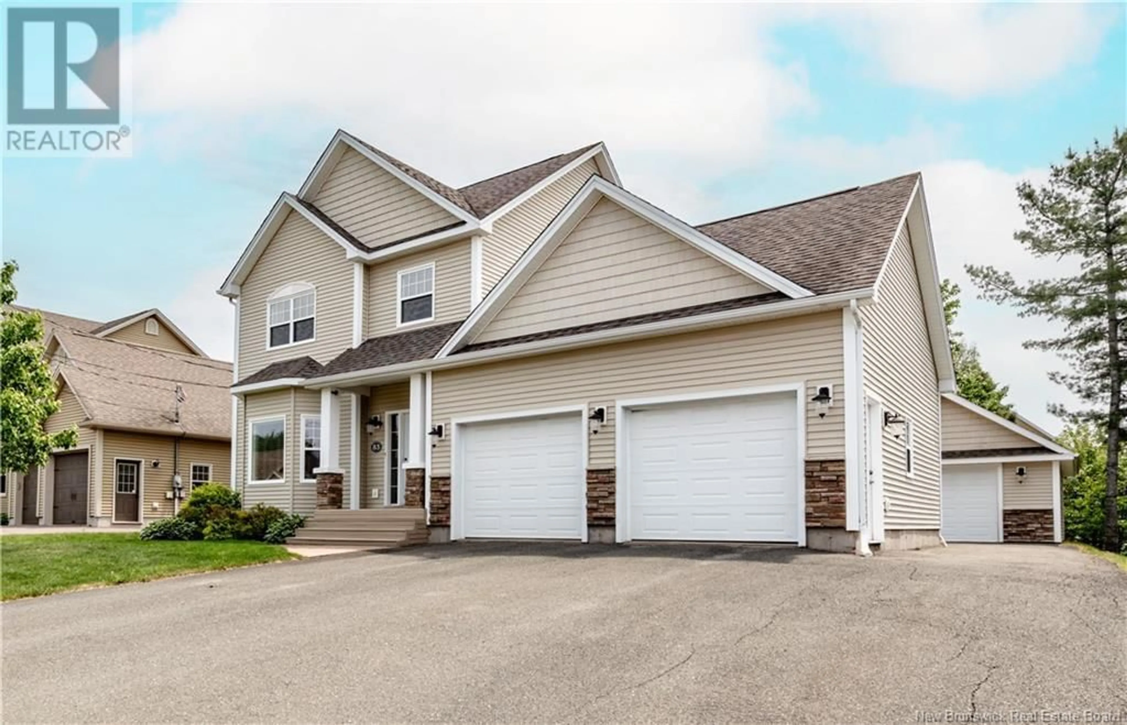 Home with vinyl exterior material, street for 83 ROUSE, Dieppe New Brunswick E1A0W2