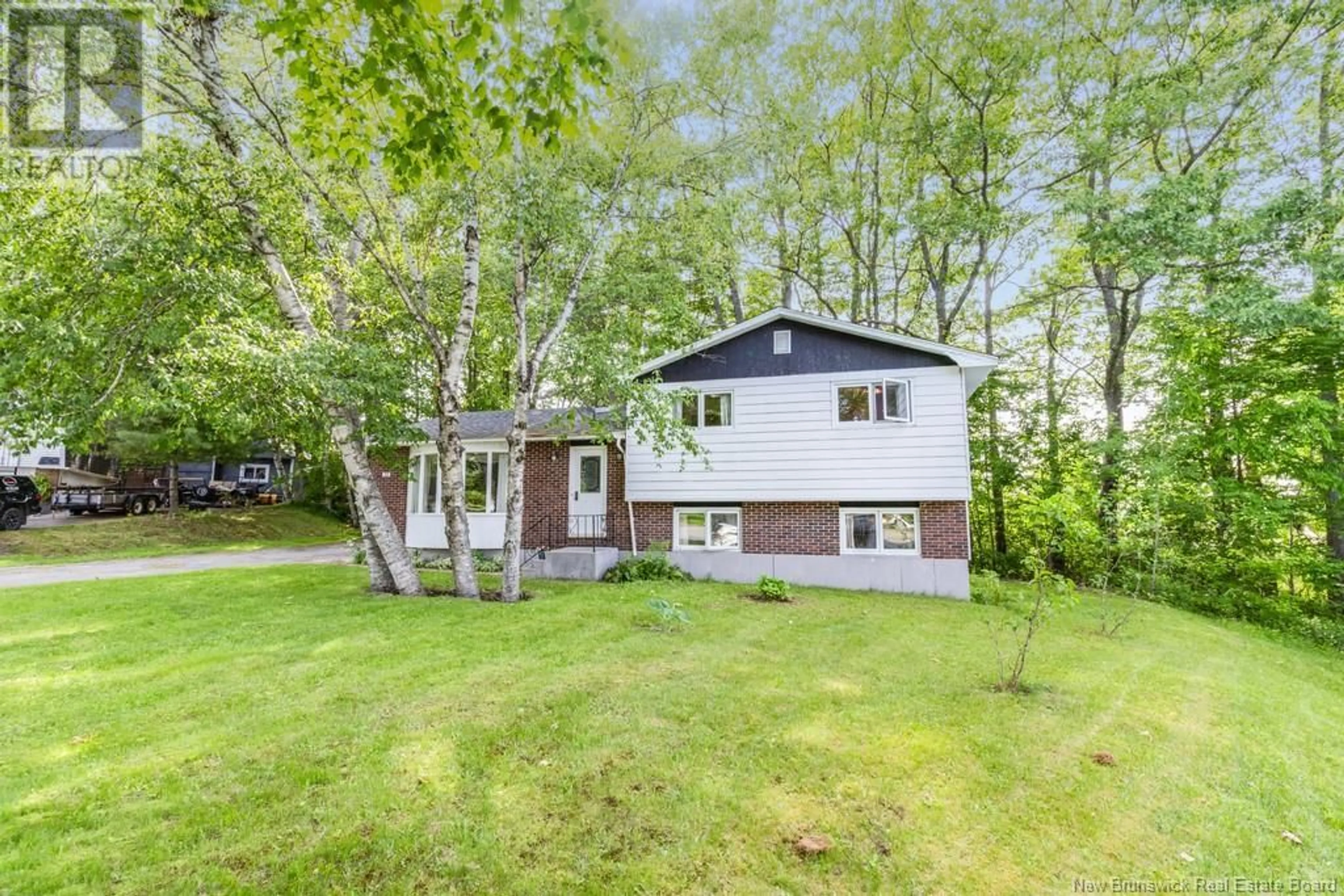 Home with vinyl exterior material, unknown for 72 LILY STREET, Fredericton New Brunswick E3C1L6