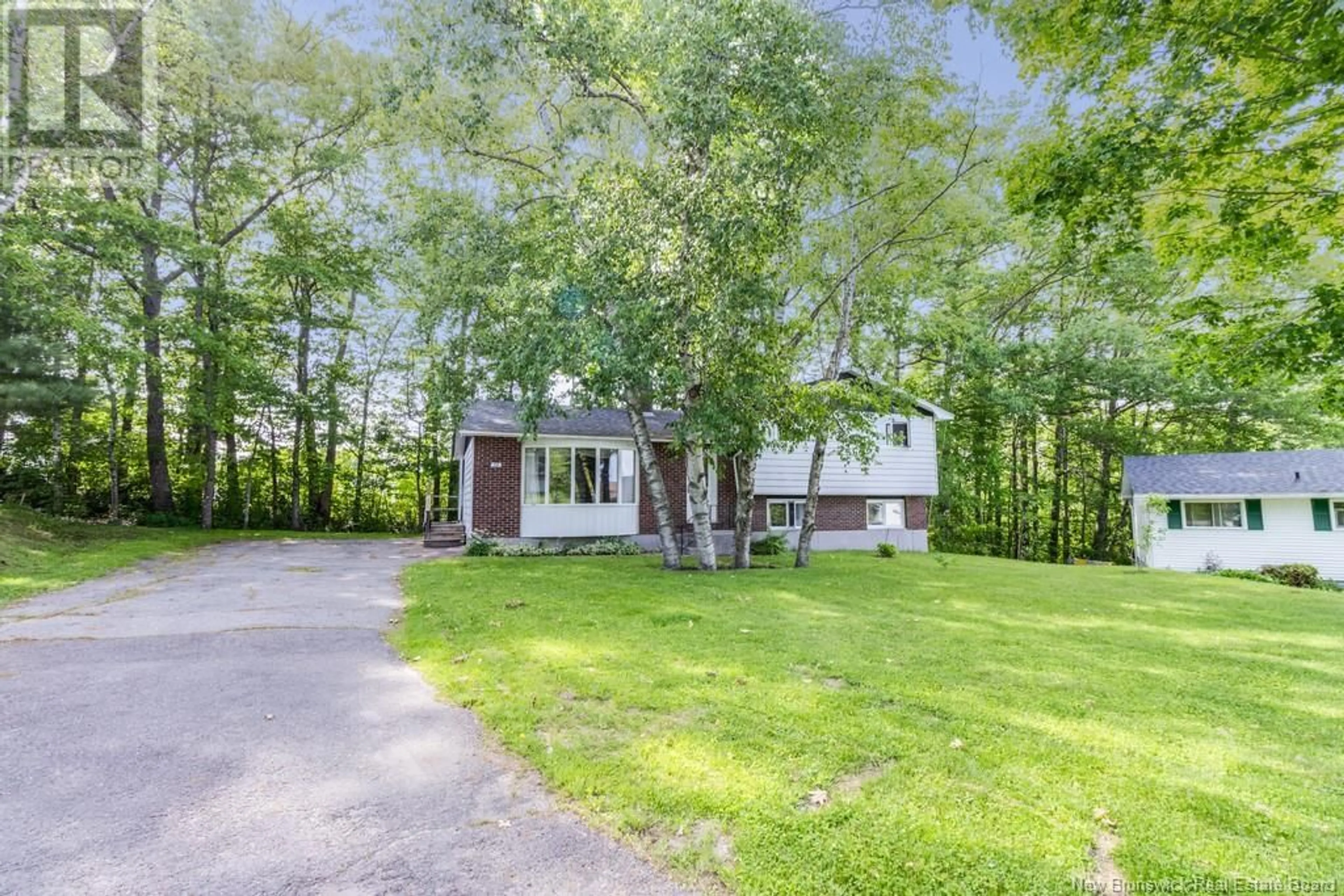 A pic from outside/outdoor area/front of a property/back of a property/a pic from drone, unknown for 72 LILY STREET, Fredericton New Brunswick E3C1L6