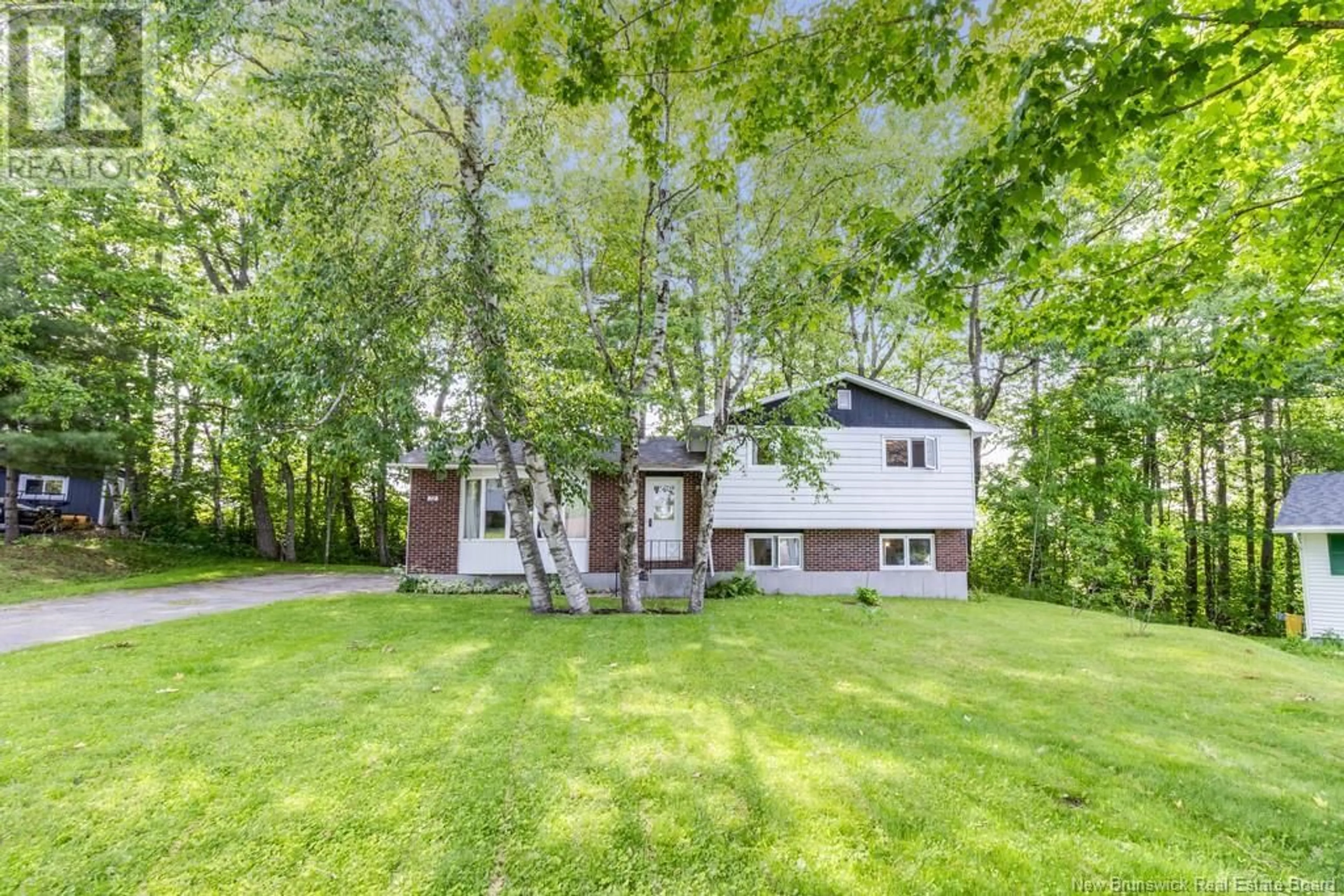 A pic from outside/outdoor area/front of a property/back of a property/a pic from drone, unknown for 72 LILY STREET, Fredericton New Brunswick E3C1L6