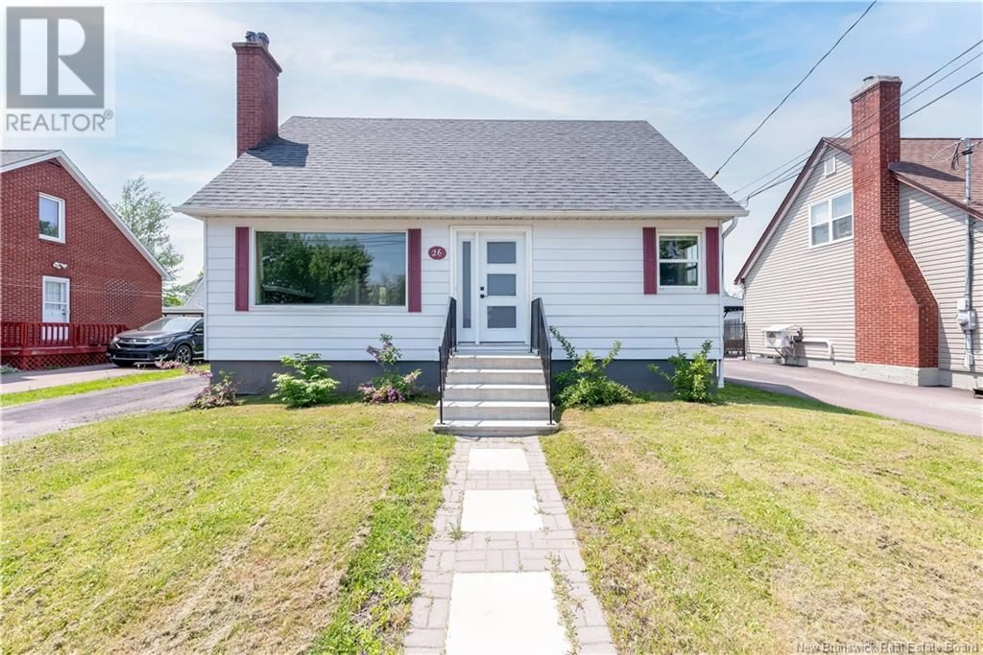 Home with vinyl exterior material, street for 26 LESLIE STREET, Moncton New Brunswick E1C6M2