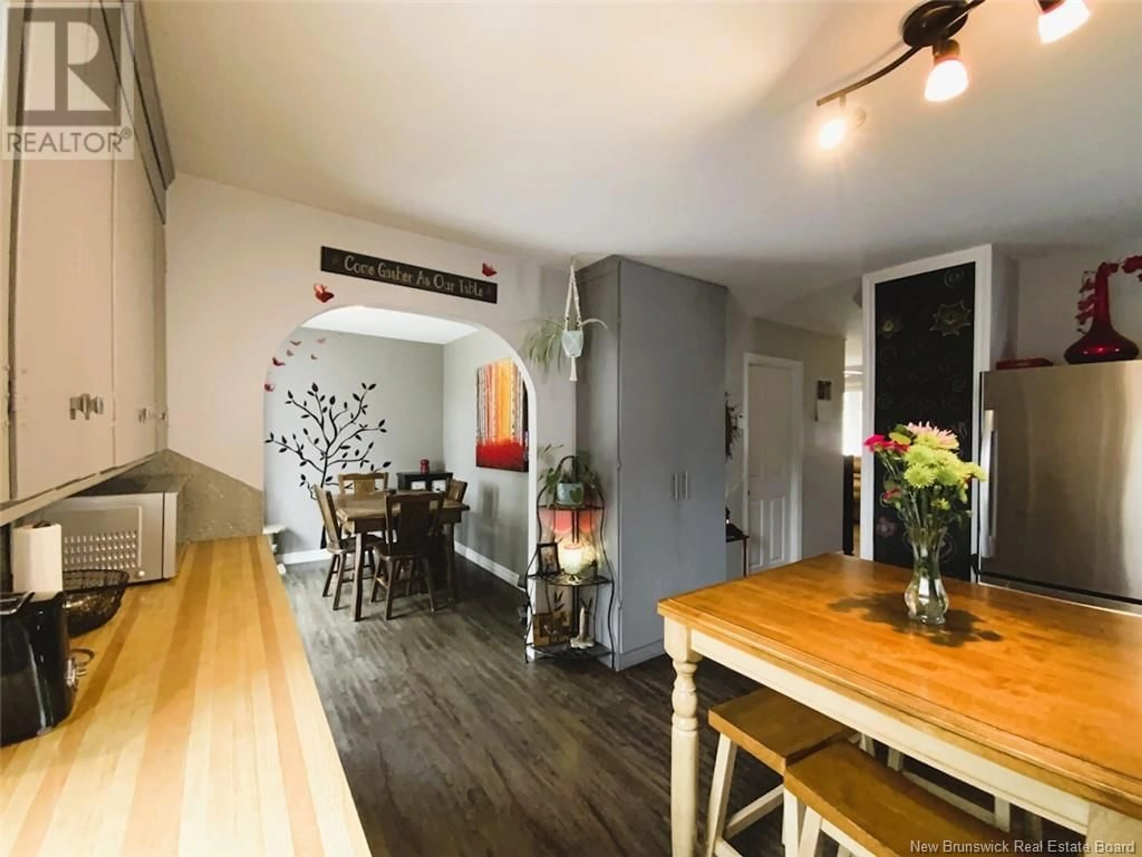 Dining room, wood/laminate floor for 122 35E AVENUE, Edmundston New Brunswick E3V2V3