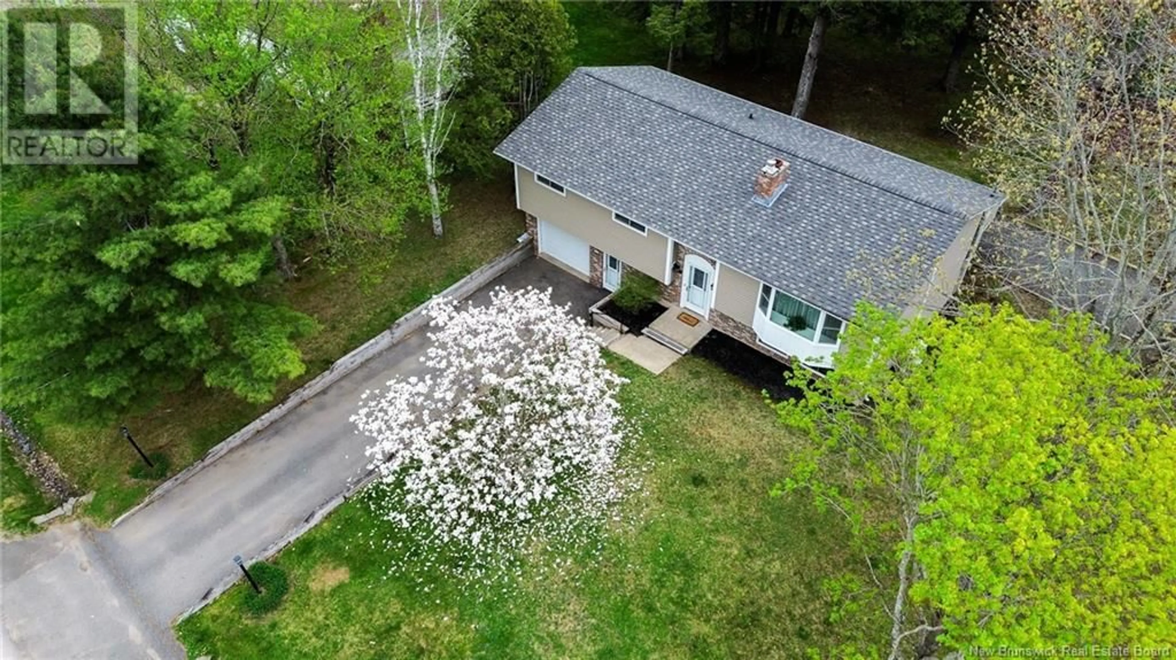 A pic from outside/outdoor area/front of a property/back of a property/a pic from drone, unknown for 15 SINCLAIR LANE, New Maryland New Brunswick E3C1J2