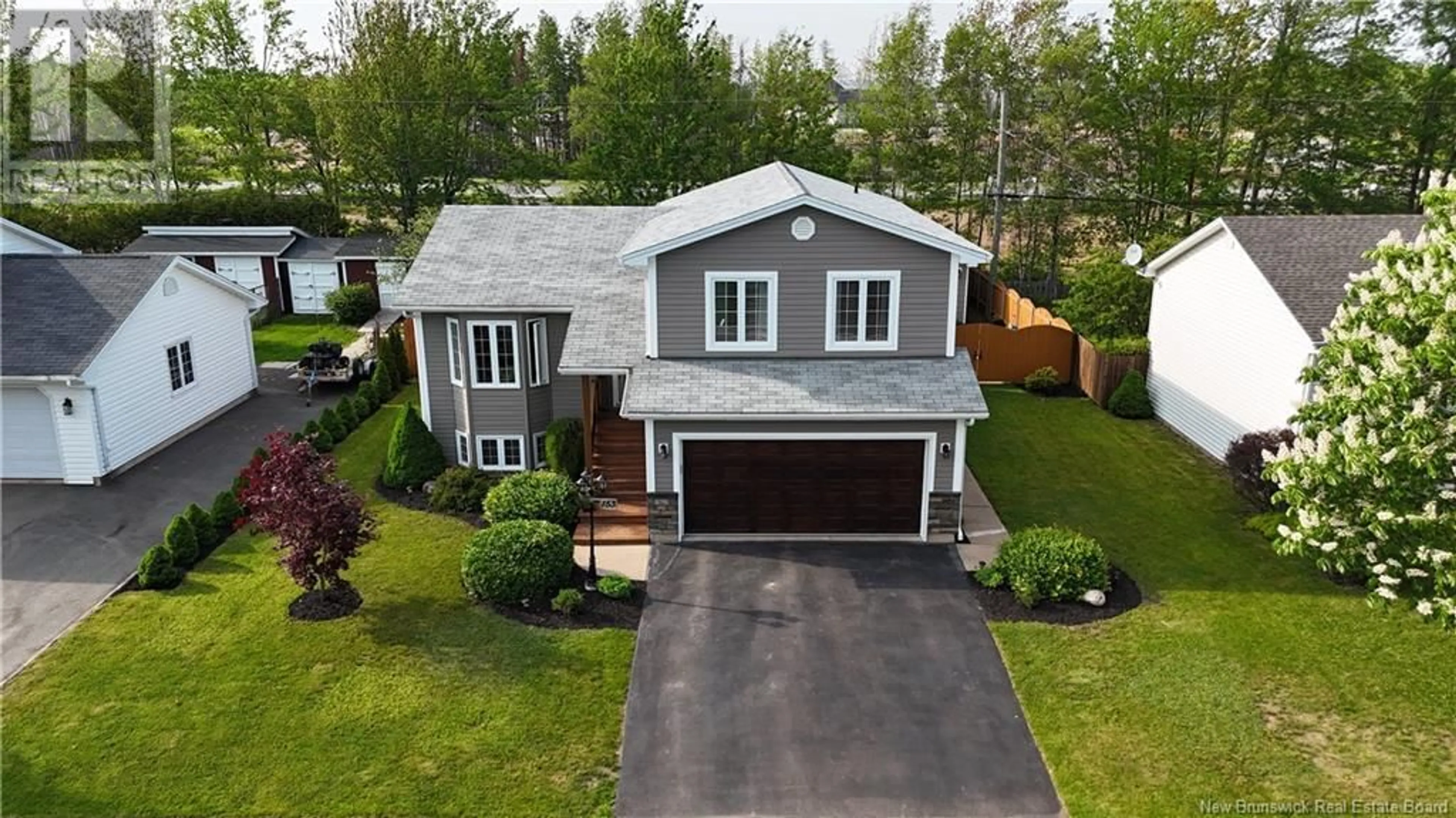 A pic from outside/outdoor area/front of a property/back of a property/a pic from drone, street for 153 ELMHURST ROAD, Moncton New Brunswick E1C9V4