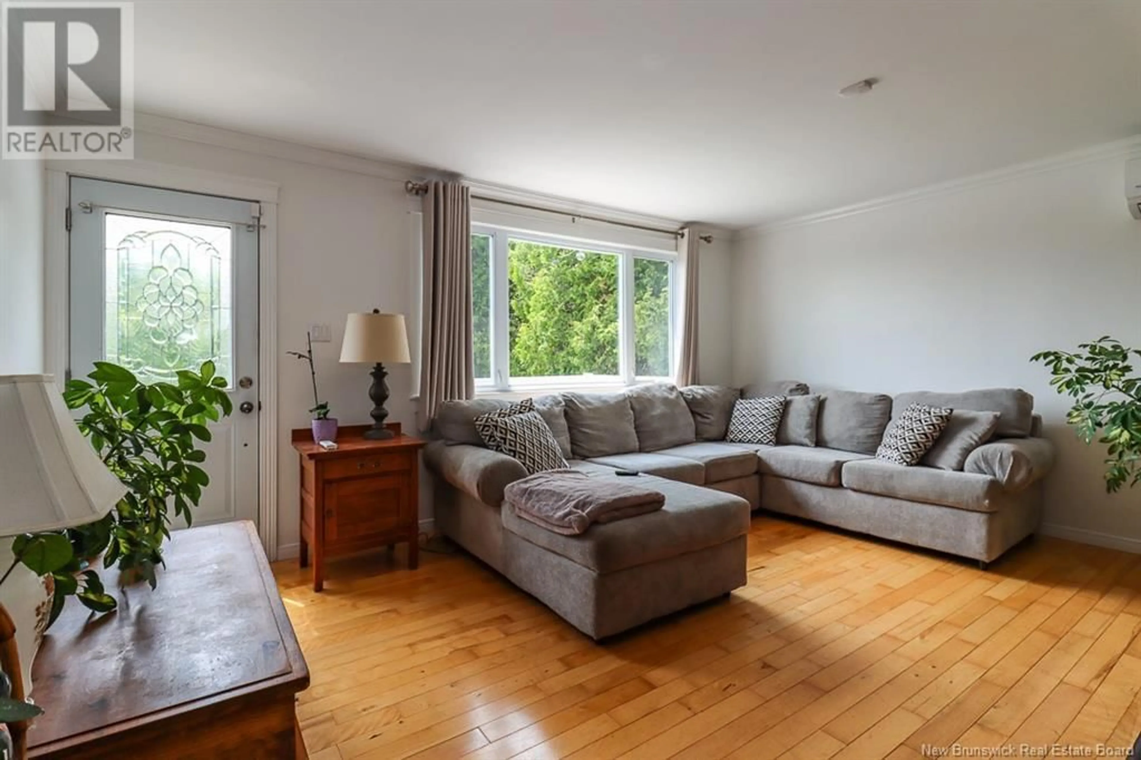 Living room with furniture, wood/laminate floor for 104 ASIED ROAD, Saint John New Brunswick E2N1G2