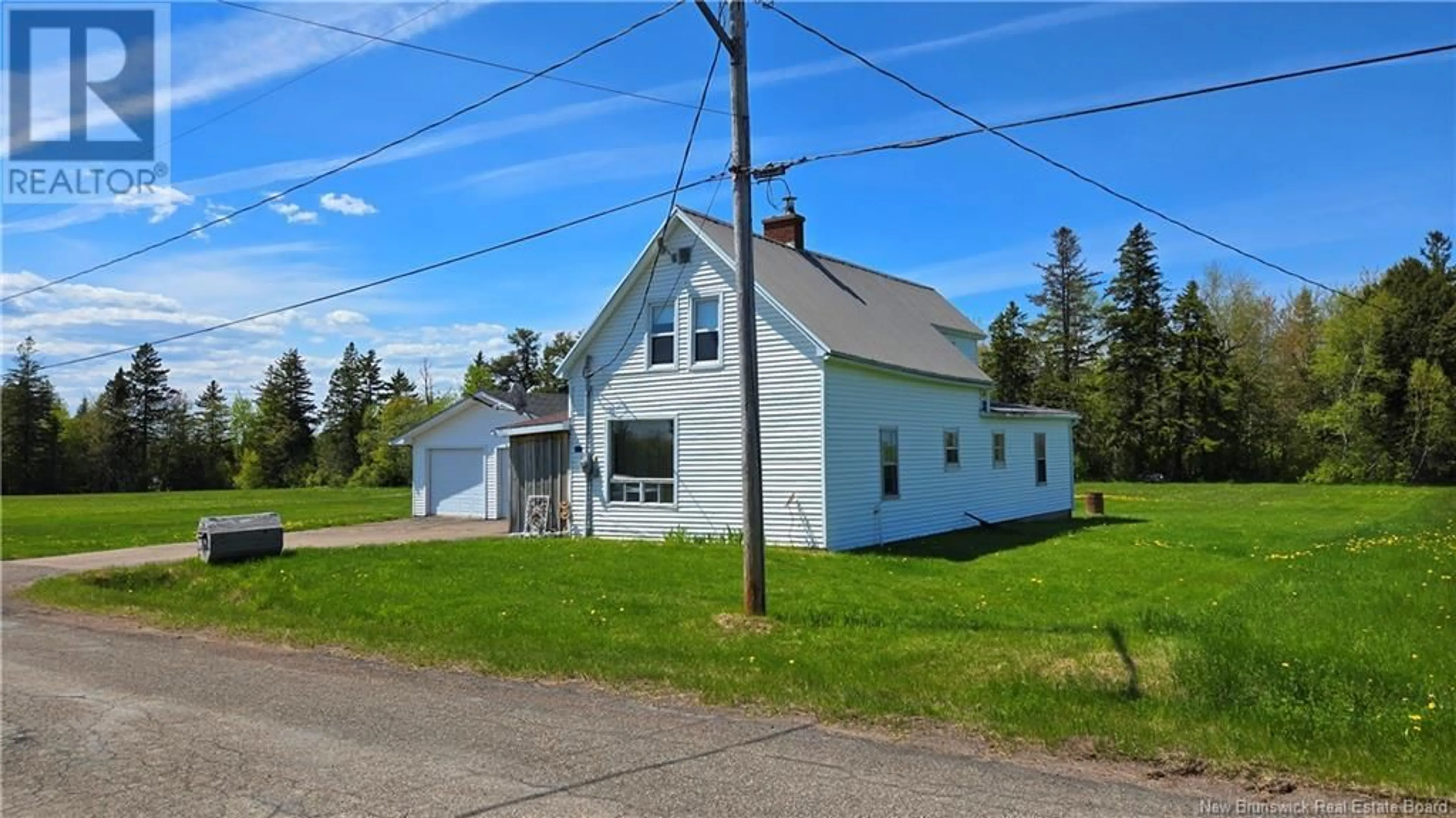 A pic from outside/outdoor area/front of a property/back of a property/a pic from drone, unknown for 50 CHEMIN GRANDE SOURCE, Saint-Grégoire New Brunswick E4V2M8