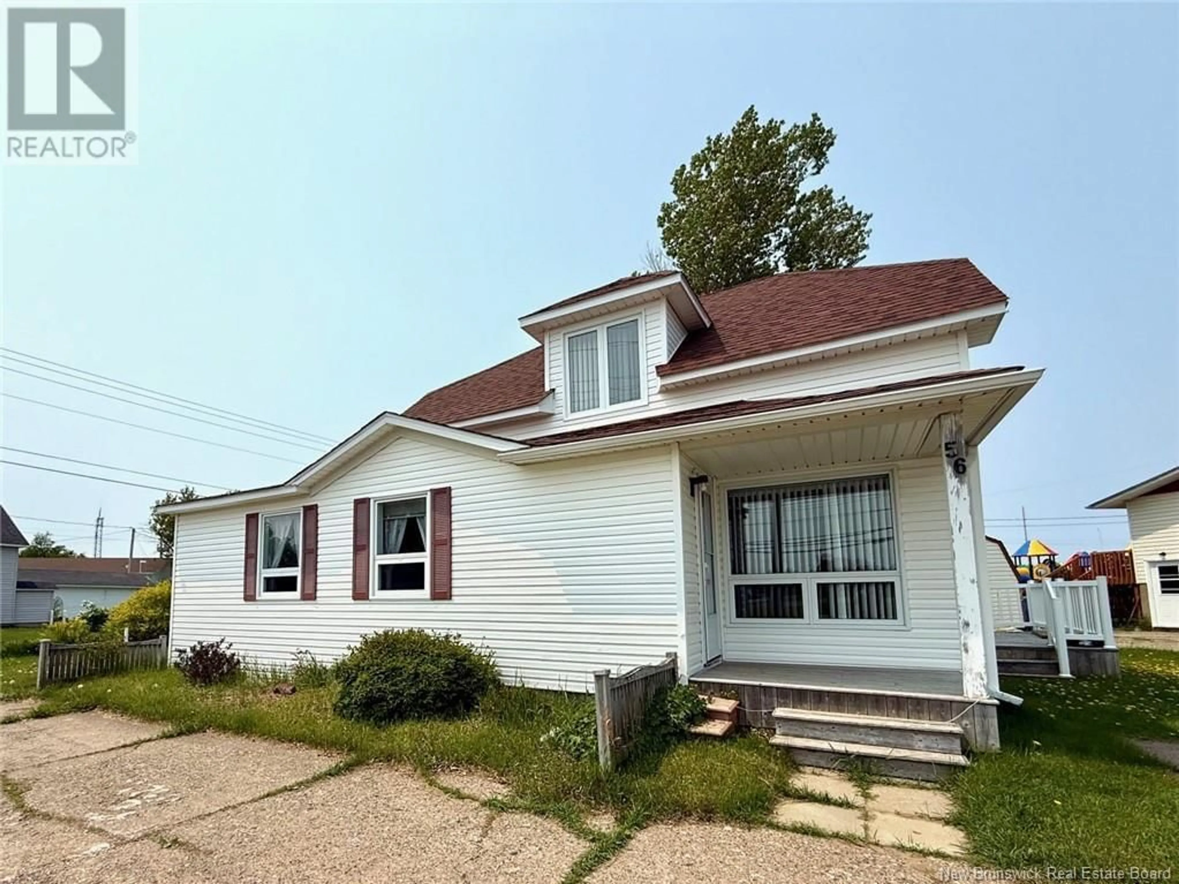 Home with vinyl exterior material, street for 56 RUE DU PÊCHEUR, Lamèque New Brunswick E8T1J4