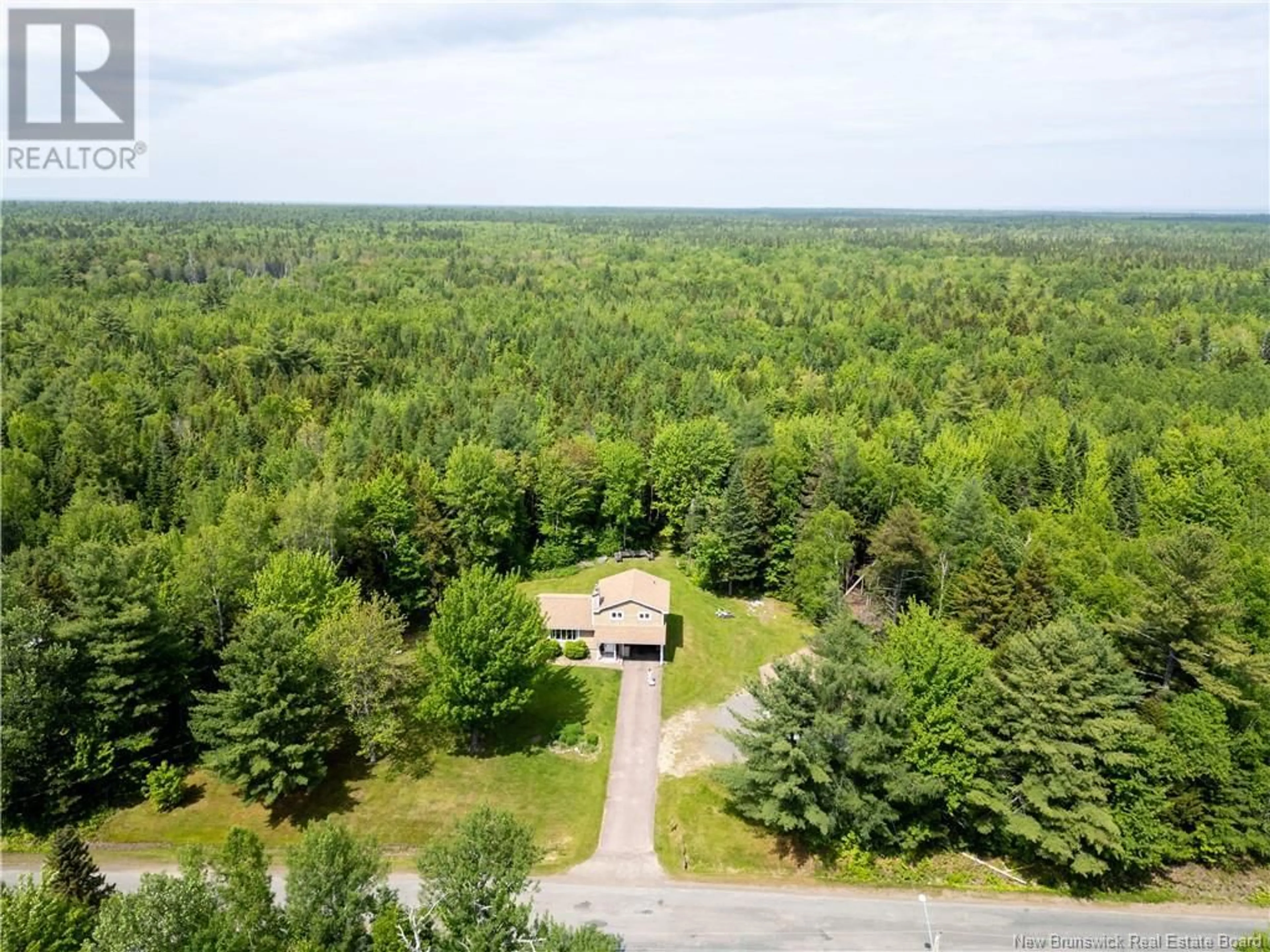 A pic from outside/outdoor area/front of a property/back of a property/a pic from drone, forest/trees view for 419 SAINT-OLIVIER, Saint-Louis New Brunswick E4X1Z5
