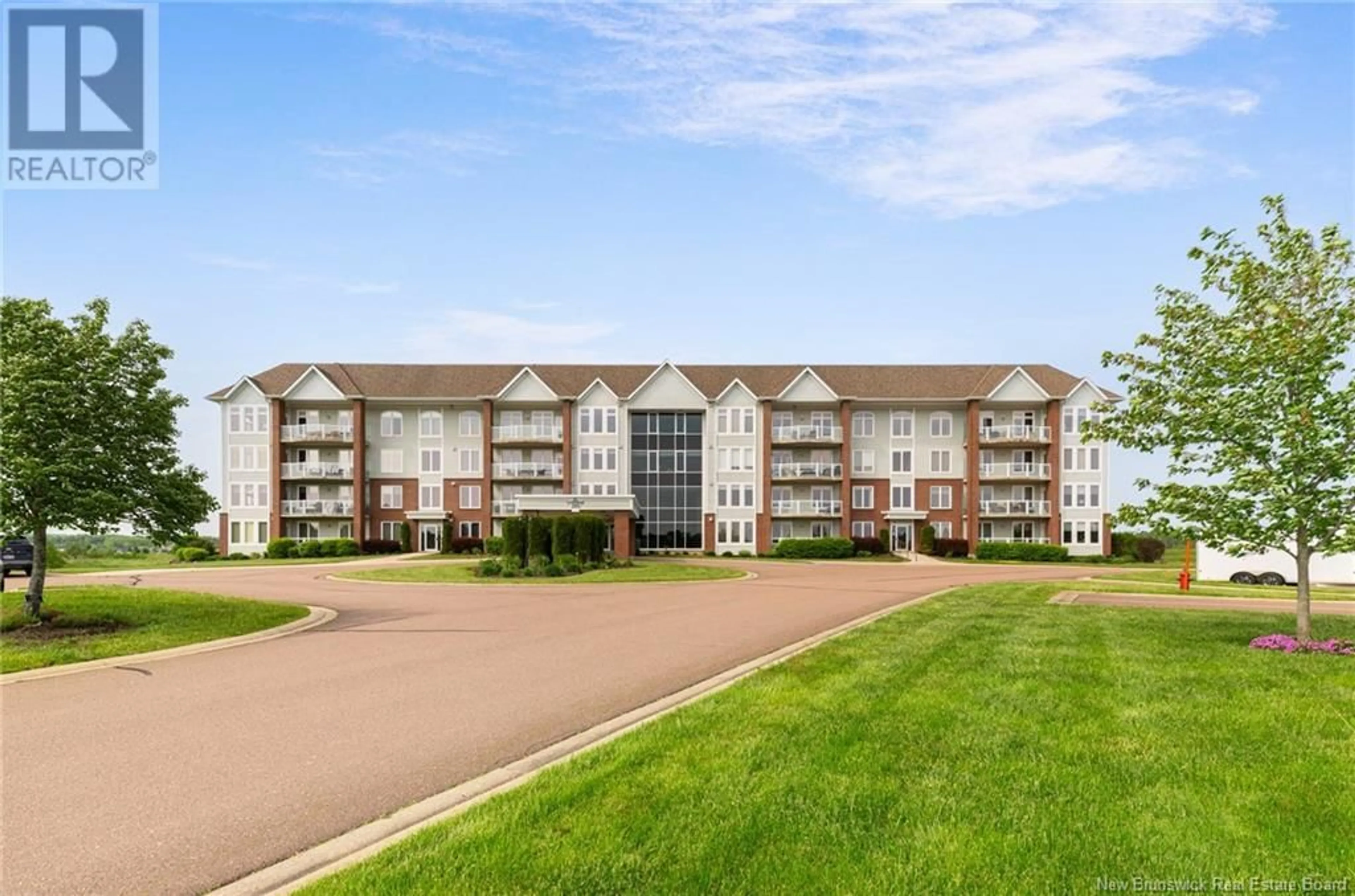 A pic from outside/outdoor area/front of a property/back of a property/a pic from drone, water/lake/river/ocean view for 210 - 185 ROYAL OAKS, Moncton New Brunswick E1H2P7