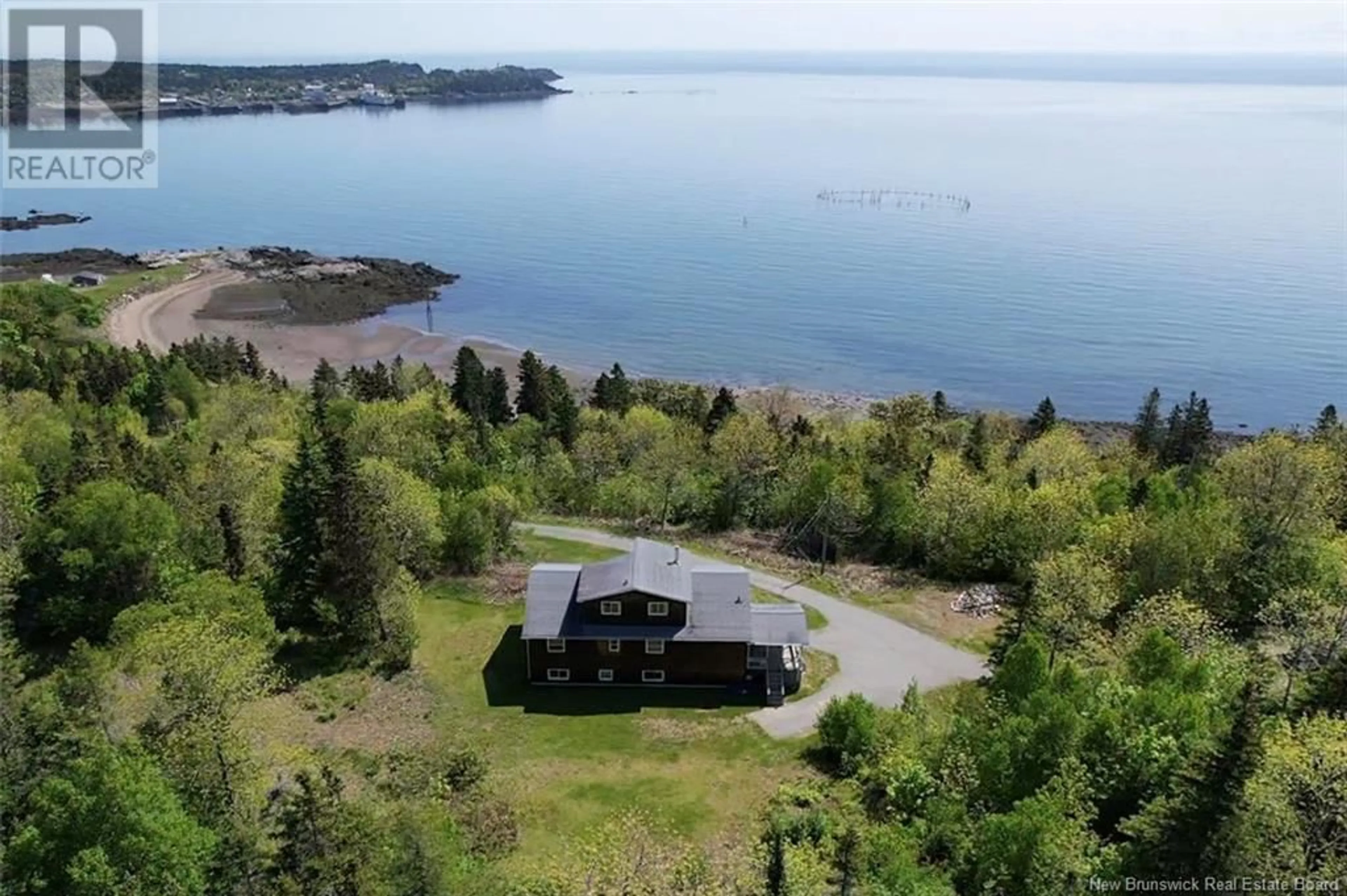 A pic from outside/outdoor area/front of a property/back of a property/a pic from drone, water/lake/river/ocean view for 290 ROUTE 776 ROUTE, Grand Manan New Brunswick E5G1A5