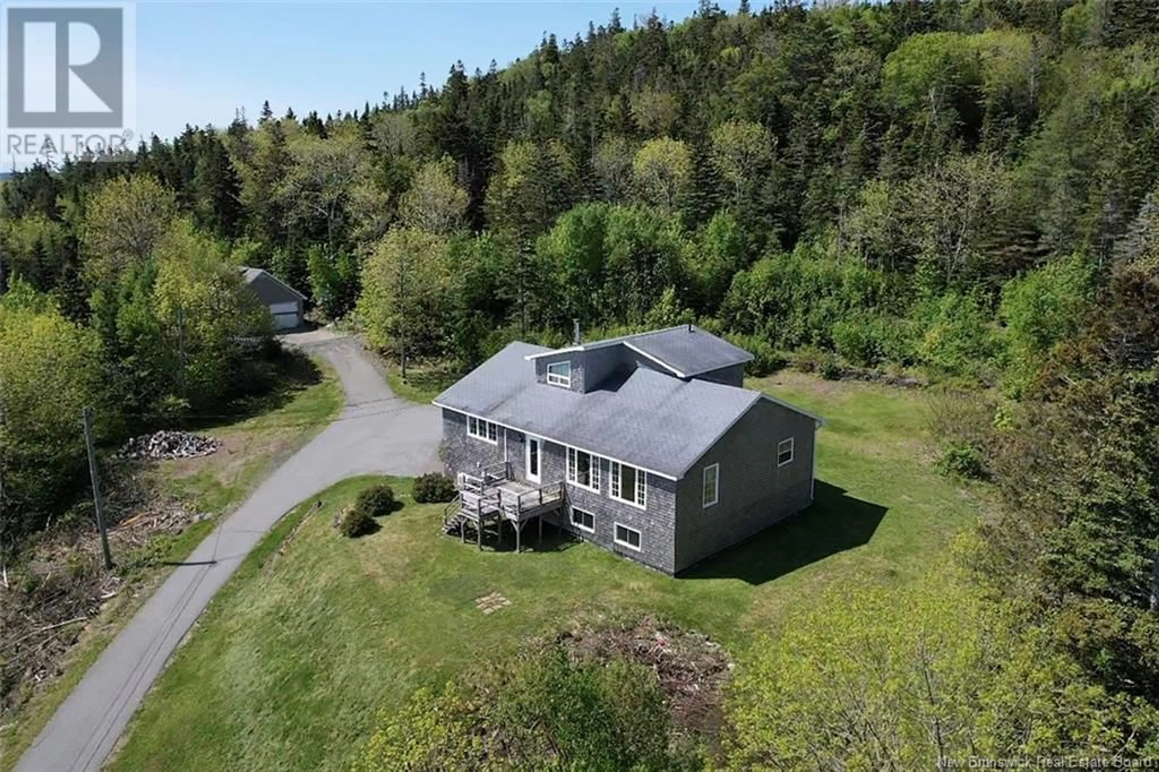 A pic from outside/outdoor area/front of a property/back of a property/a pic from drone, unknown for 290 ROUTE 776 ROUTE, Grand Manan New Brunswick E5G1A5