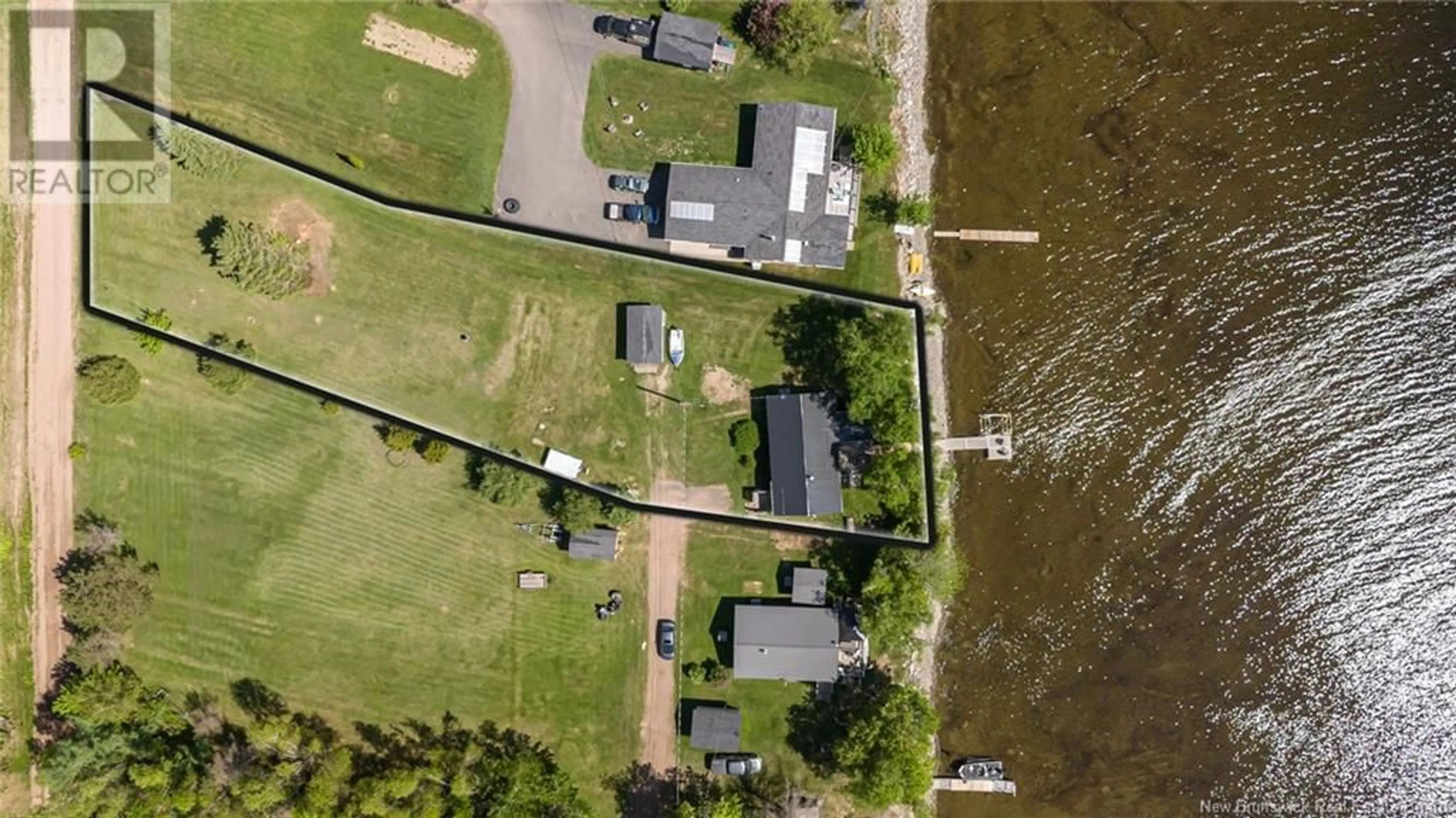 A pic from outside/outdoor area/front of a property/back of a property/a pic from drone, water/lake/river/ocean view for 40 WARRENS LANE, Harvey New Brunswick E6K2L5
