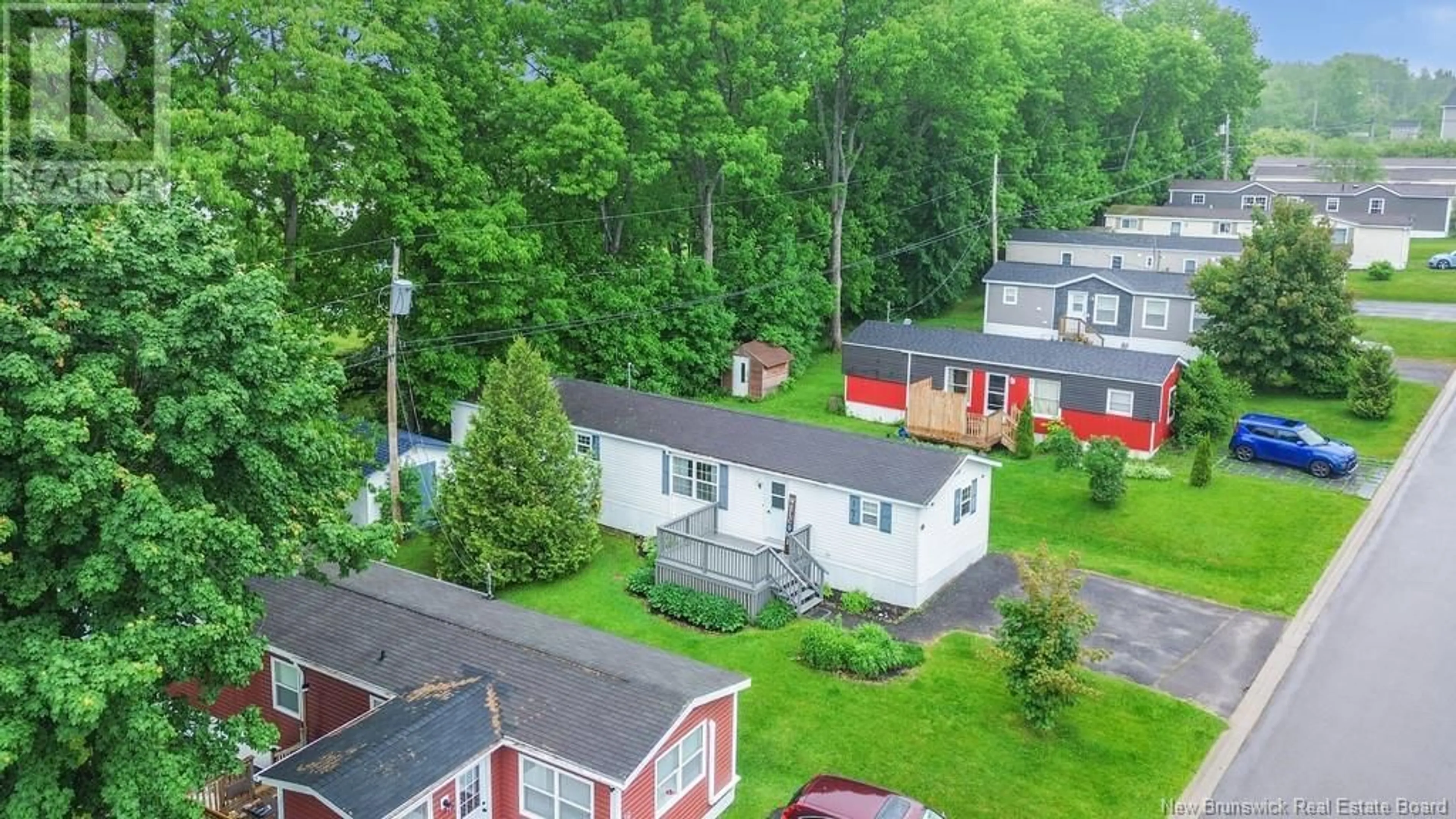 A pic from outside/outdoor area/front of a property/back of a property/a pic from drone, street for 14 MACINTOSH STREET, Fredericton New Brunswick E3C1L8