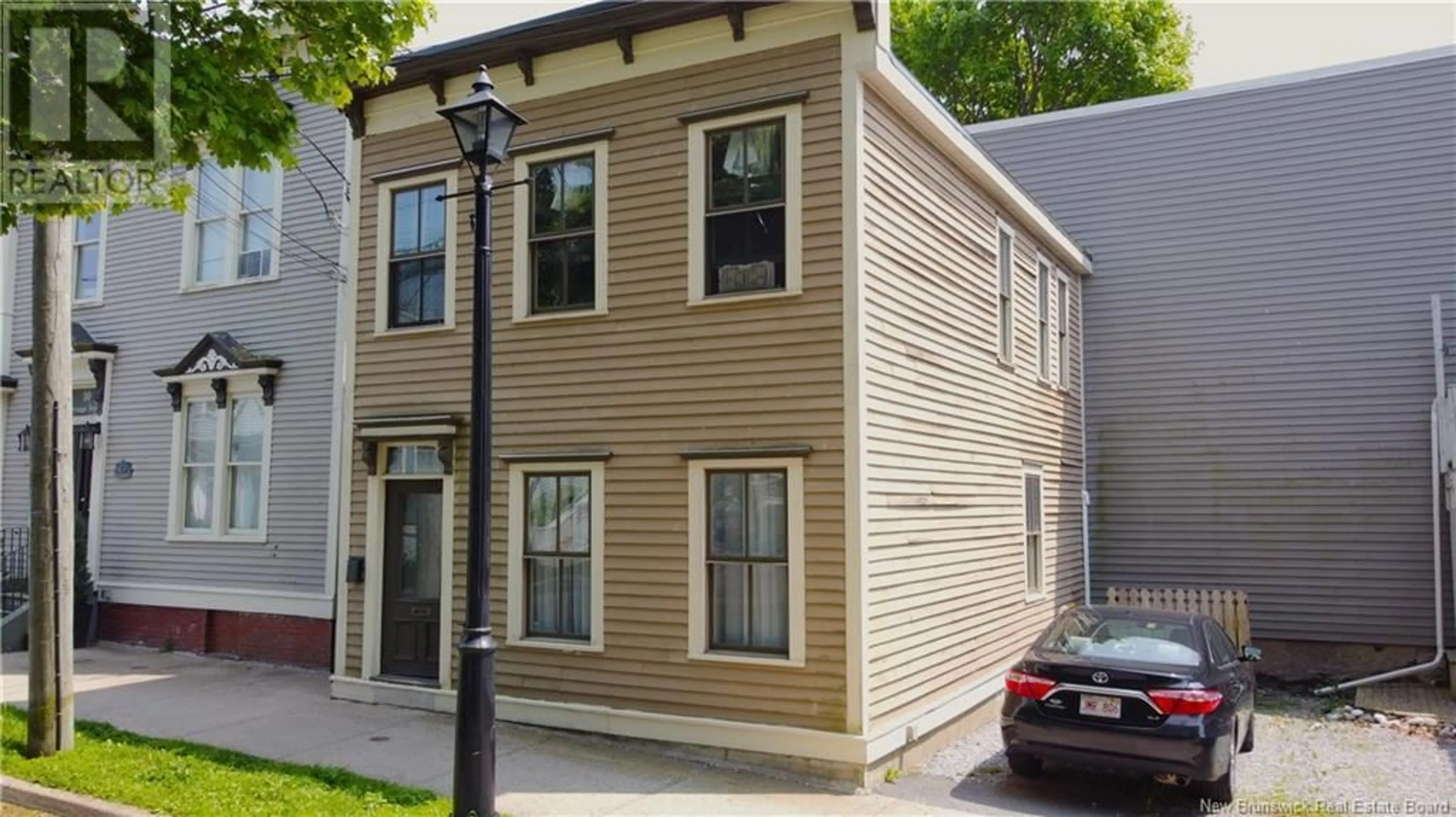 Home with vinyl exterior material, street for 8 ORANGE STREET, Saint John New Brunswick E2L1M1