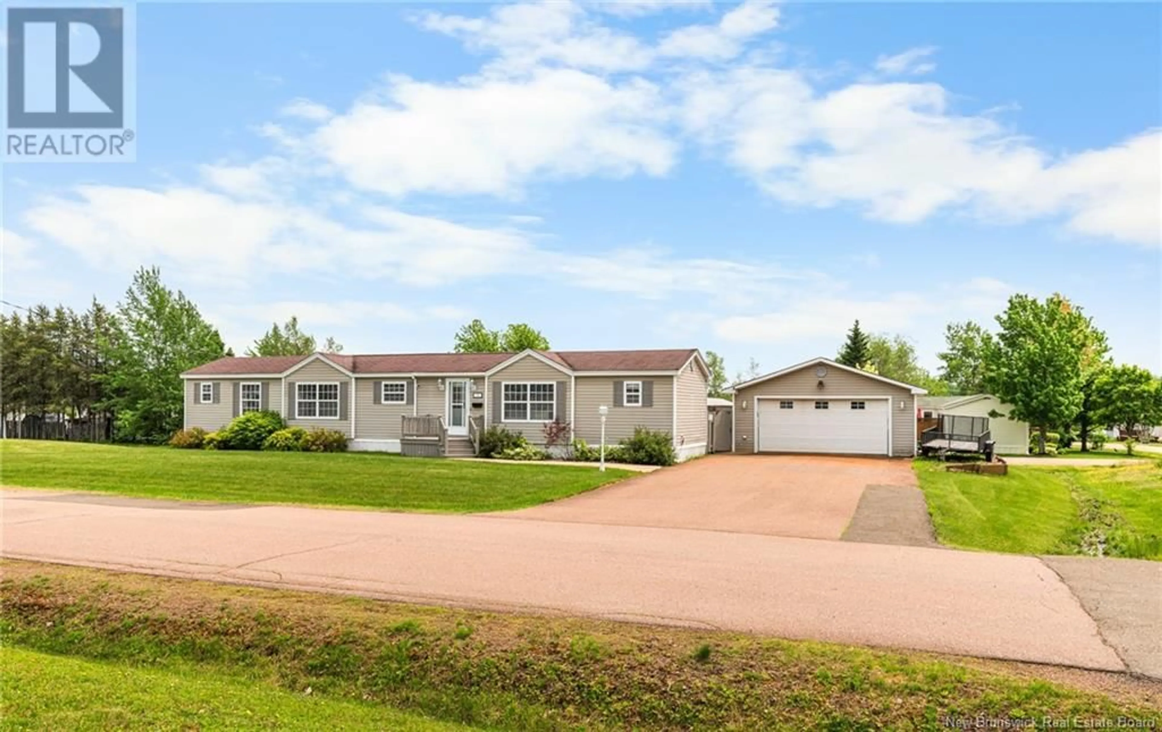 A pic from outside/outdoor area/front of a property/back of a property/a pic from drone, unknown for 26 BLUE ASH, Moncton New Brunswick E1H3R3