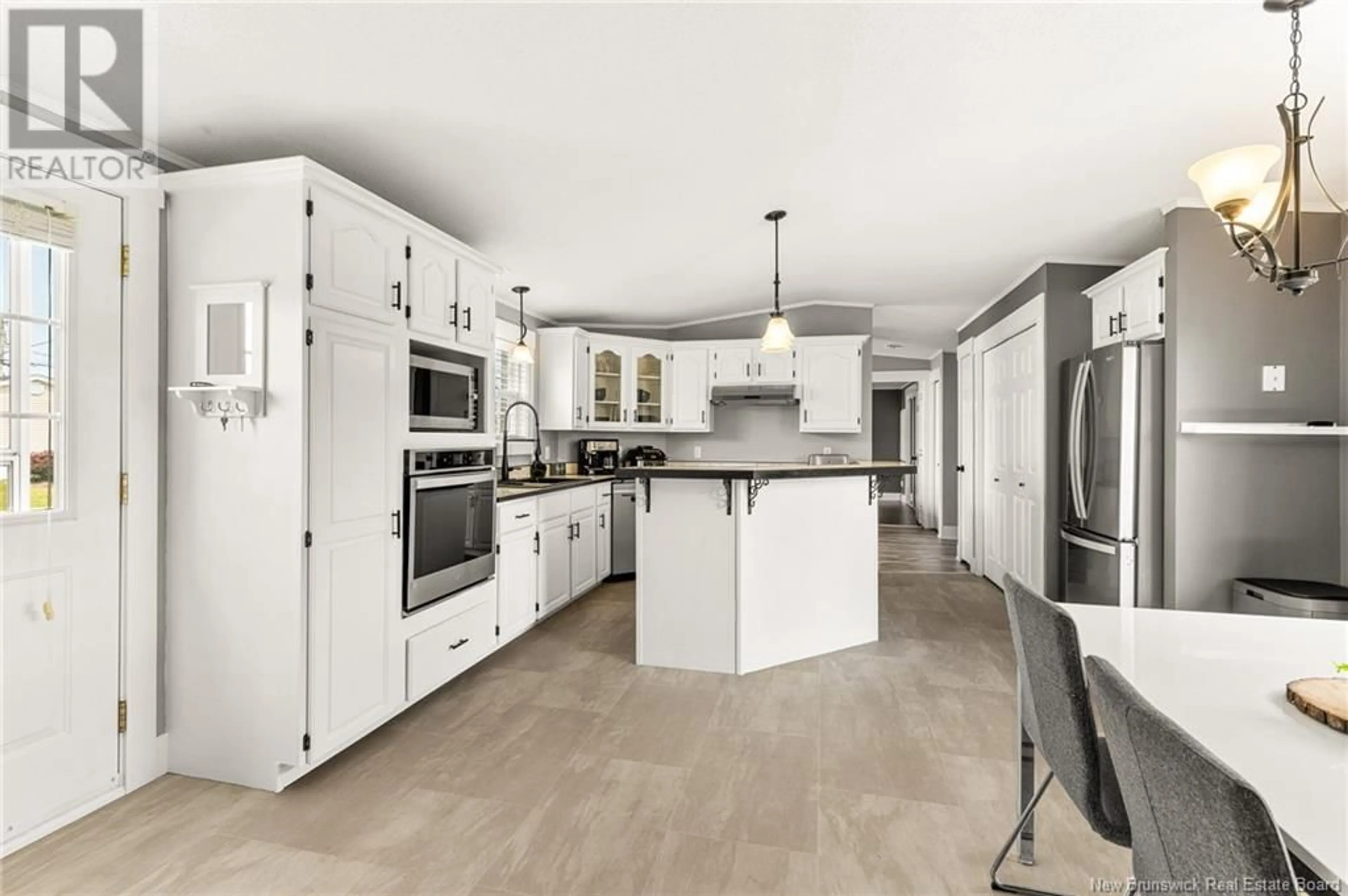 Open concept kitchen, ceramic/tile floor for 26 BLUE ASH, Moncton New Brunswick E1H3R3